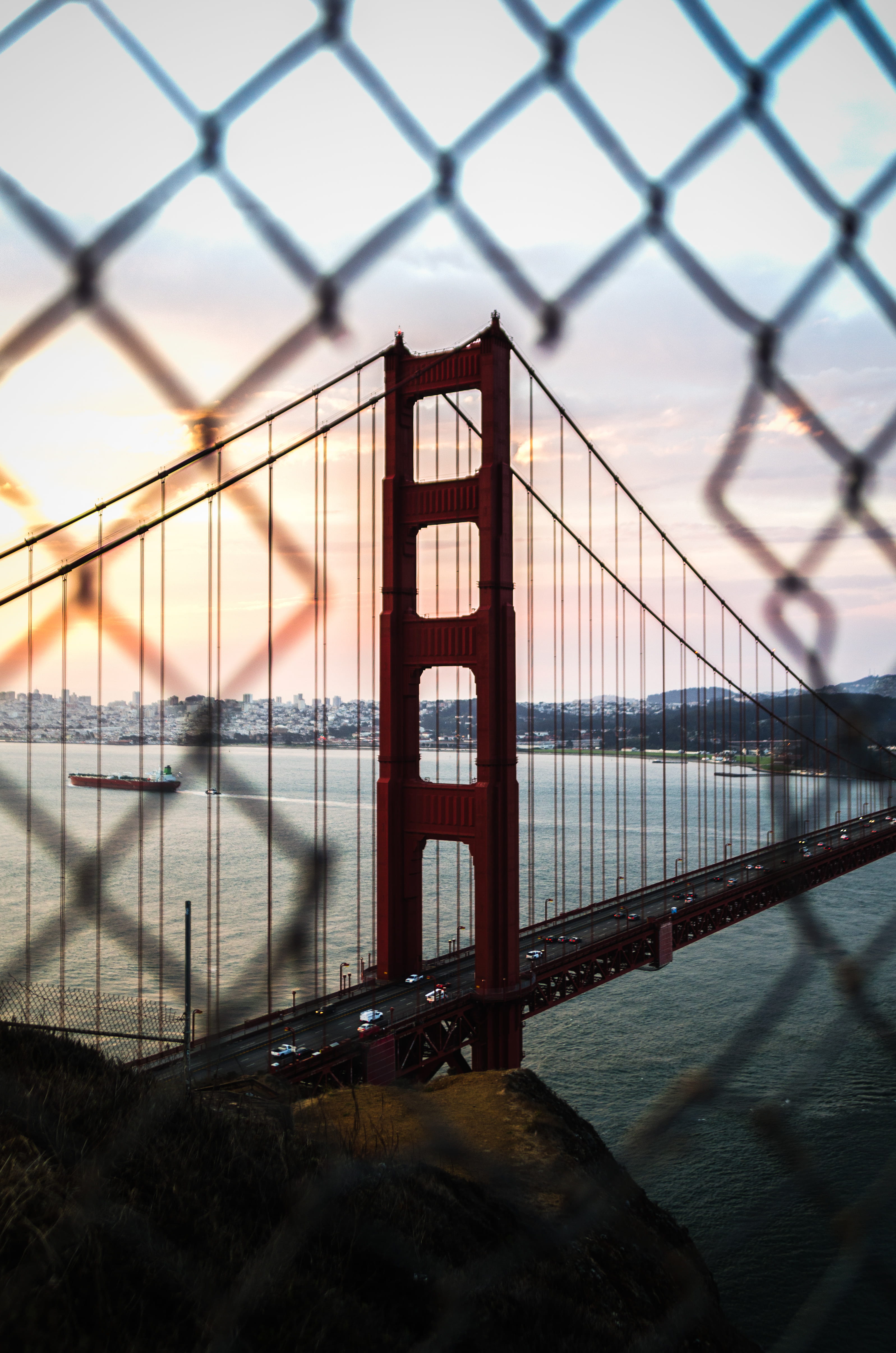 grid, chainlink, traffic, landmark, bridge, hole, golden gate, francisco, view, engineering, sky, california, ship, structure, architecture, gate, transportation, Phone HD Wallpaper