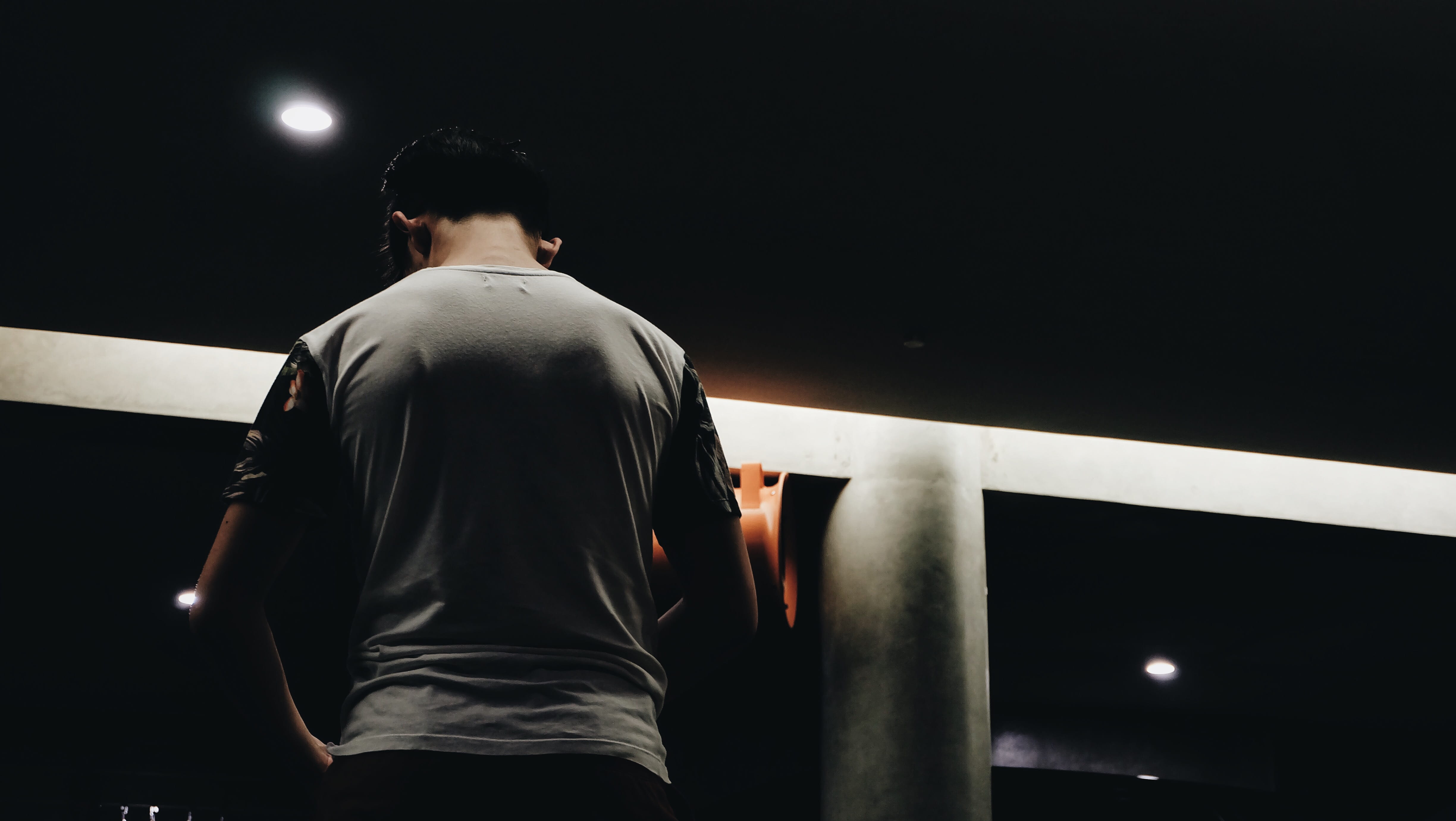 adult, adults only, indoors, pillar, one young man only, night, young men, street, people, selective, crew neck, waist up, contemplation, black background, HD Wallpaper