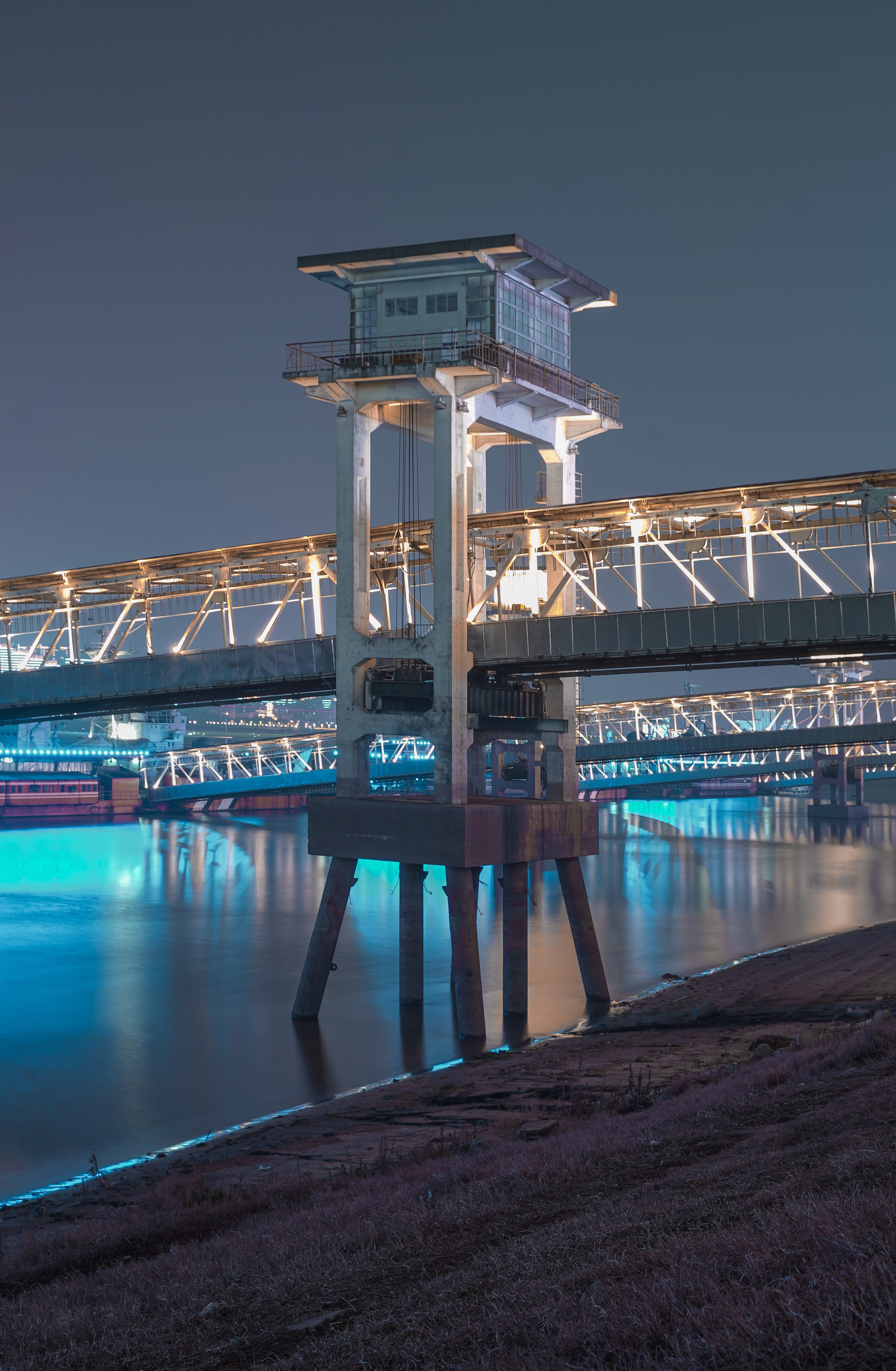 5K, connection, dock, building exterior, gray, tower, no people, pier, illuminated, drawbridge, reflection, water, pedestrian, port, built structure, clear sky, Phone HD Wallpaper