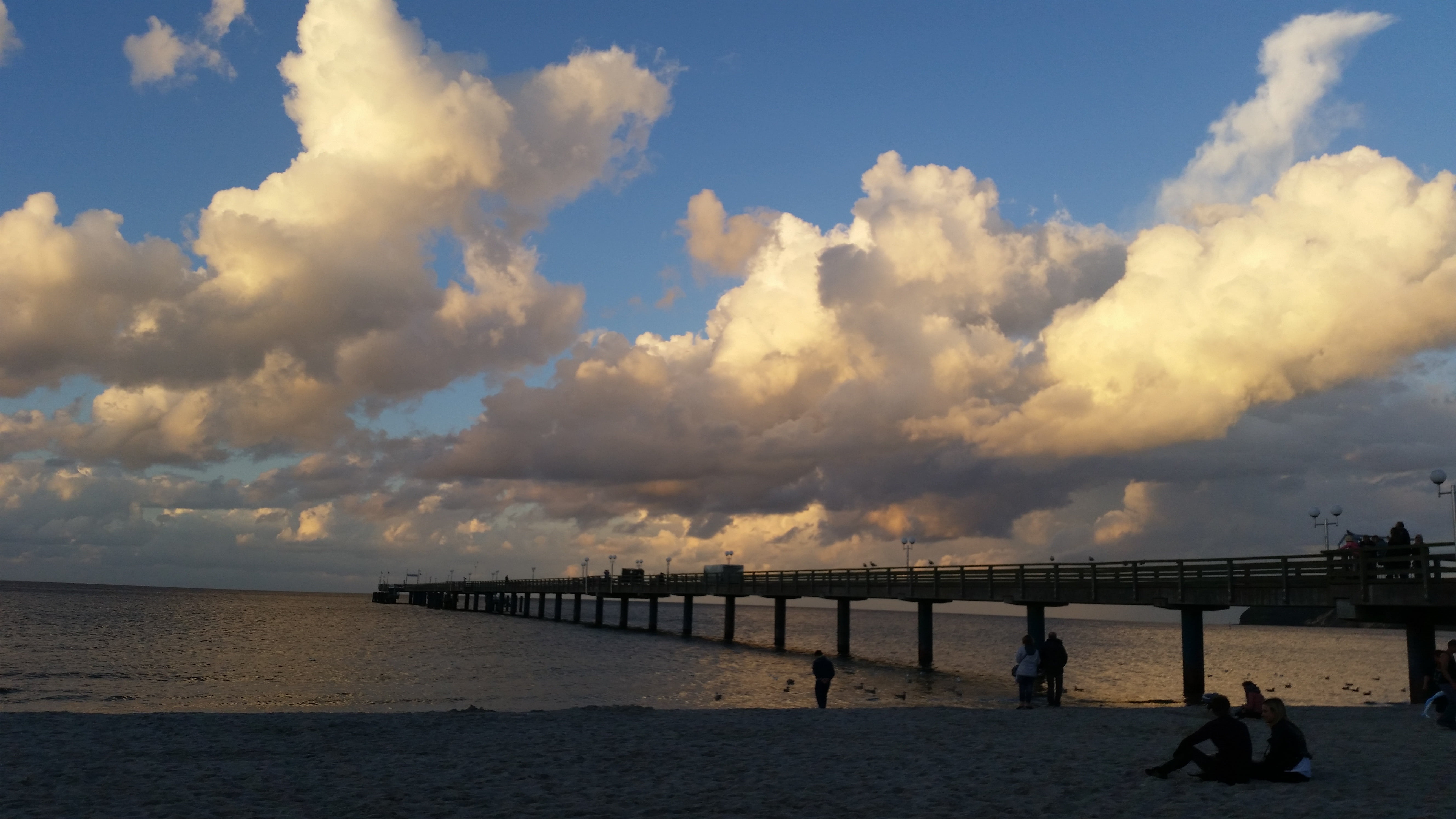 built structure, water, horizon over water, real people, baltic sea, clouds, beach, evening, sky, bridge - man made structure, horizon, people, leisure activity, HD Wallpaper