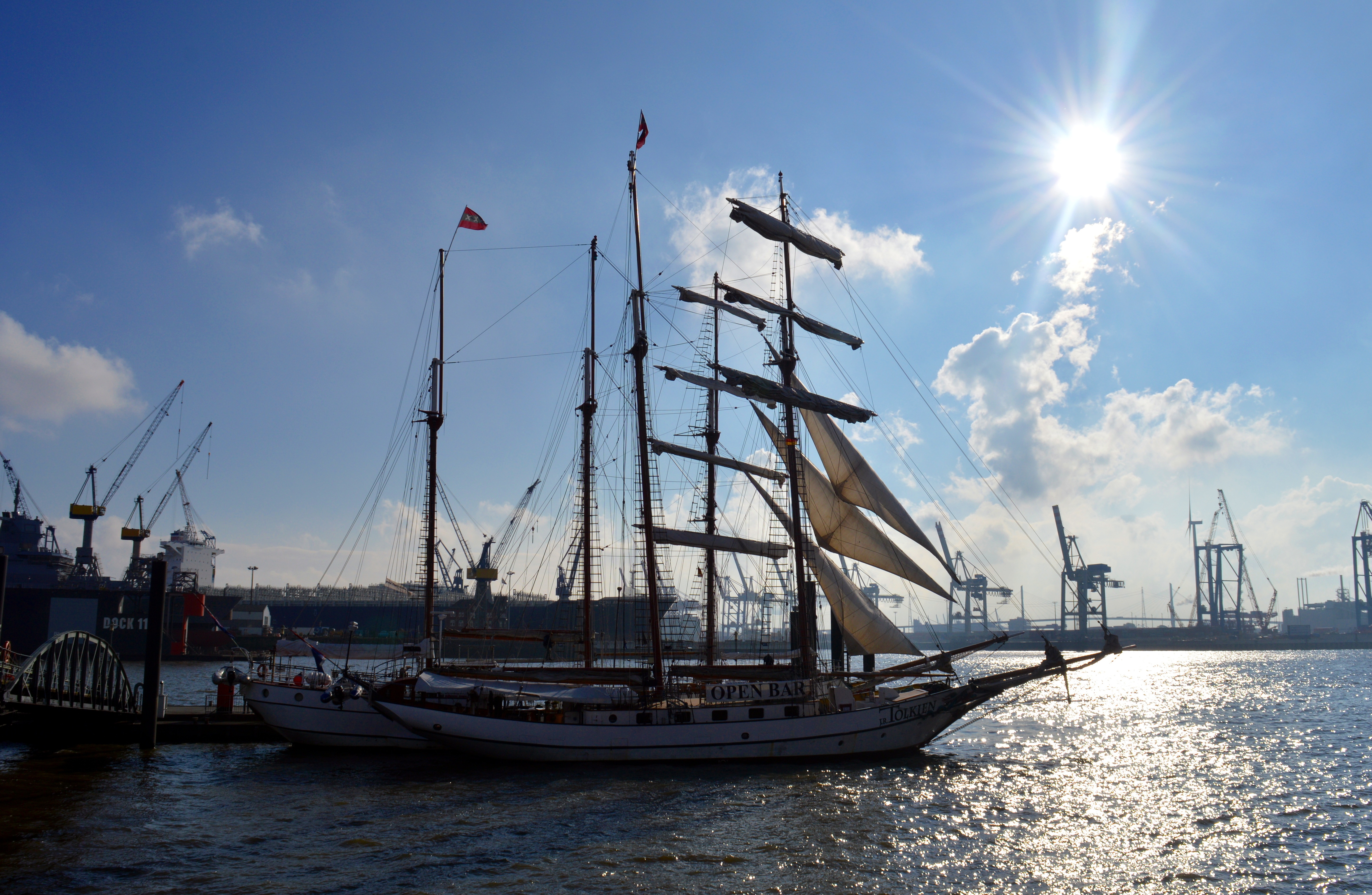sun, nature, mode of transportation, hamburg, sail, sailing Ship, city, sailboat, lens flare, pole, cloud - sky, tourists, no people, transportation, mast, HD Wallpaper