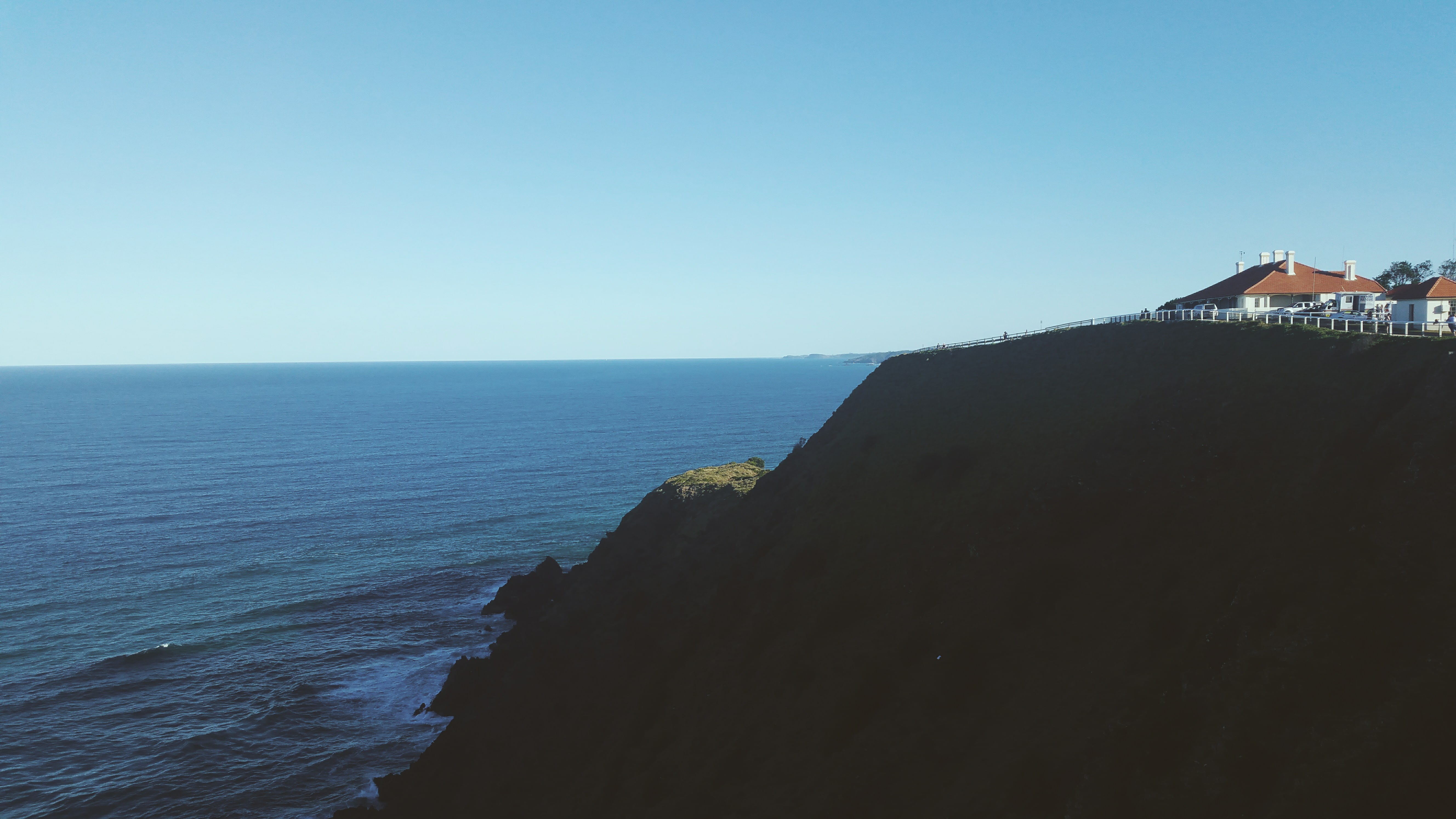 architecture, no people, sky, building exterior, water, ocean, land, horizon over water, blue, outdoors, byron bay, day, clear sky, cliff, 5K, horizon, HD Wallpaper