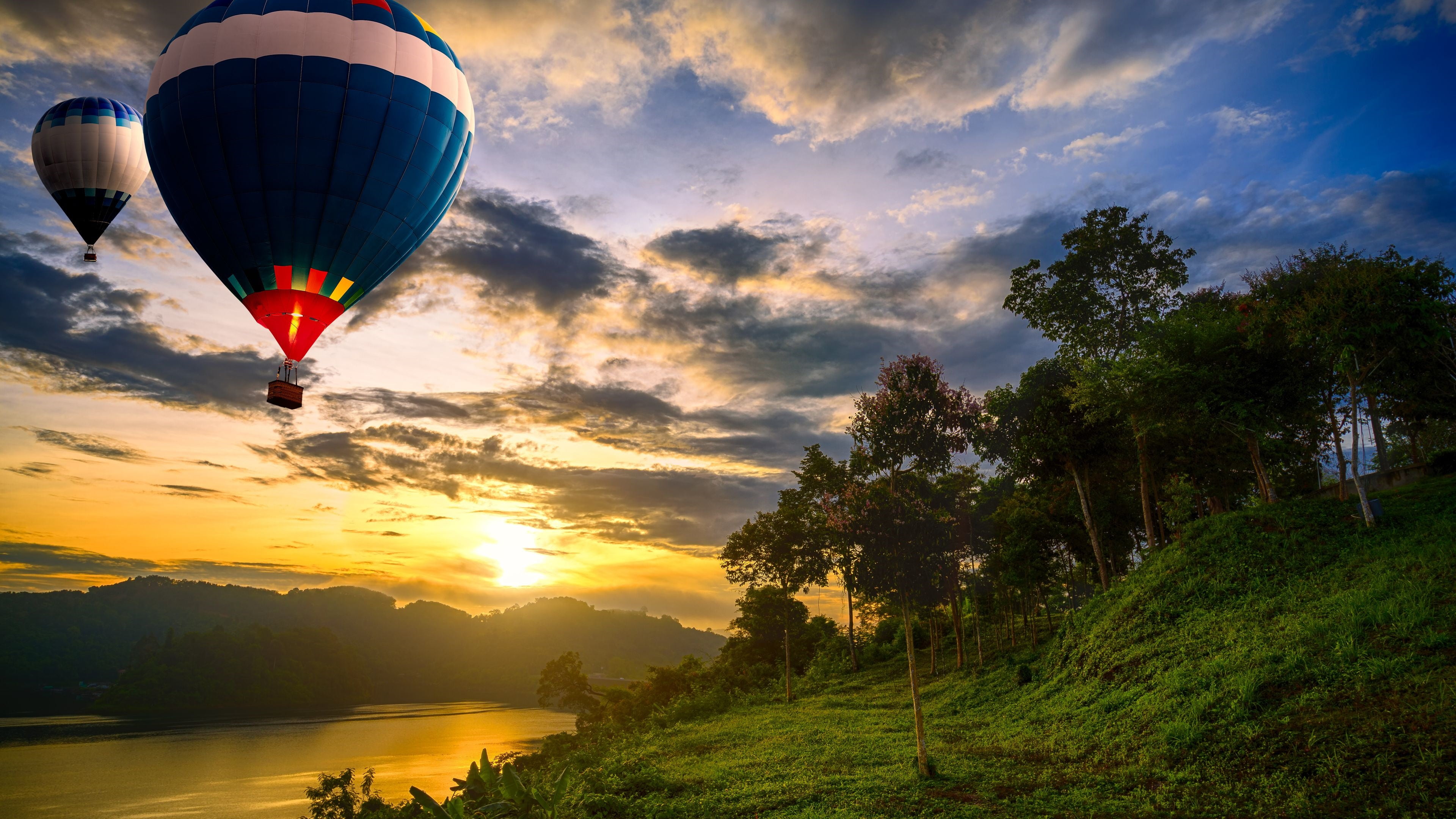 mid-air, flight, adventure, landscape, lake, sunlight, plant, mode of transportation, tree, hot air balloon, flying, water, nature, air balloon, outdoors, HD Wallpaper