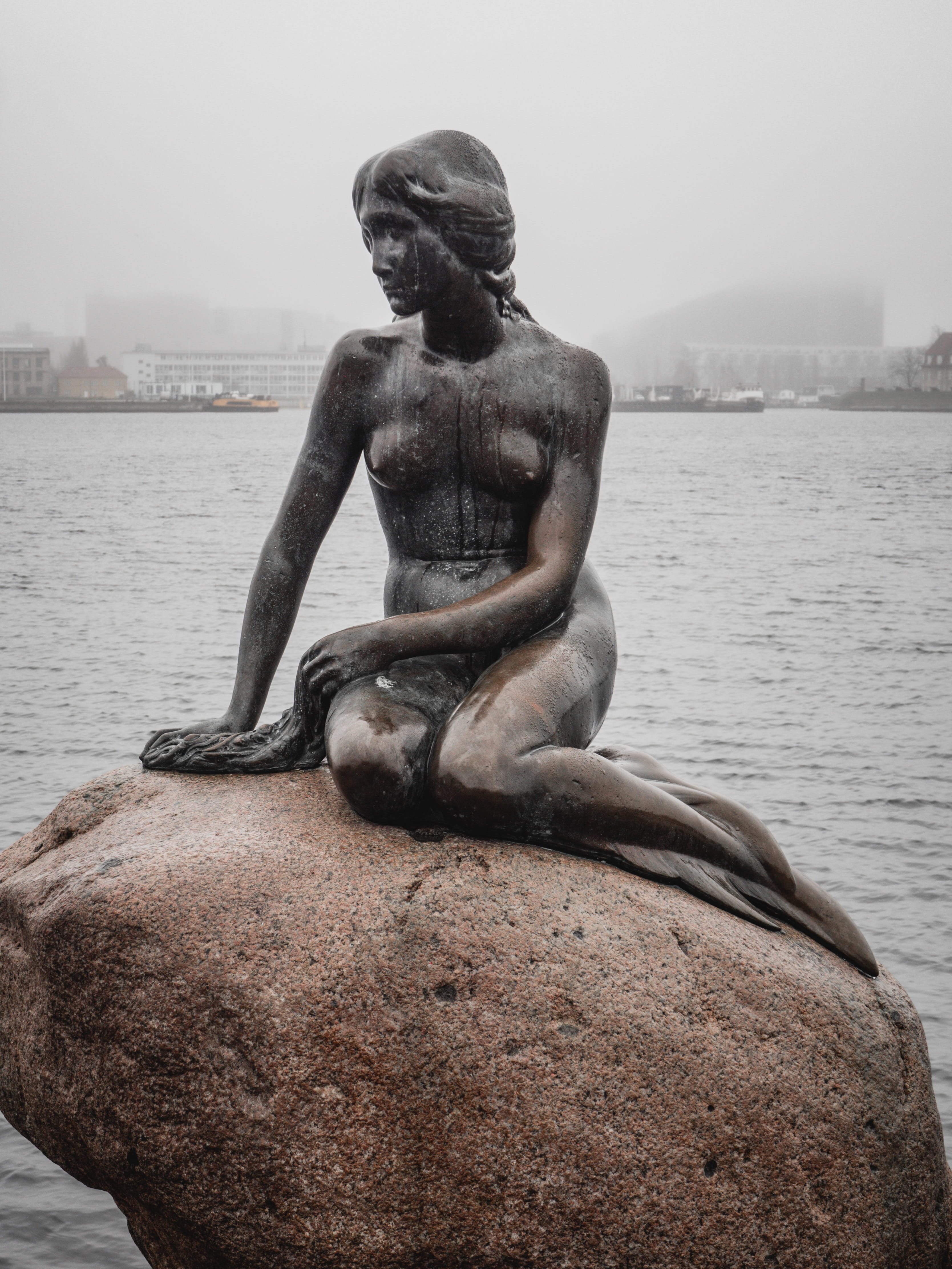 sky, architecture, outdoors, built structure, religion, landmark, day, copenhagen, travel, human representation, solid, sculpture, denmark, mermaid, statue, Phone HD Wallpaper