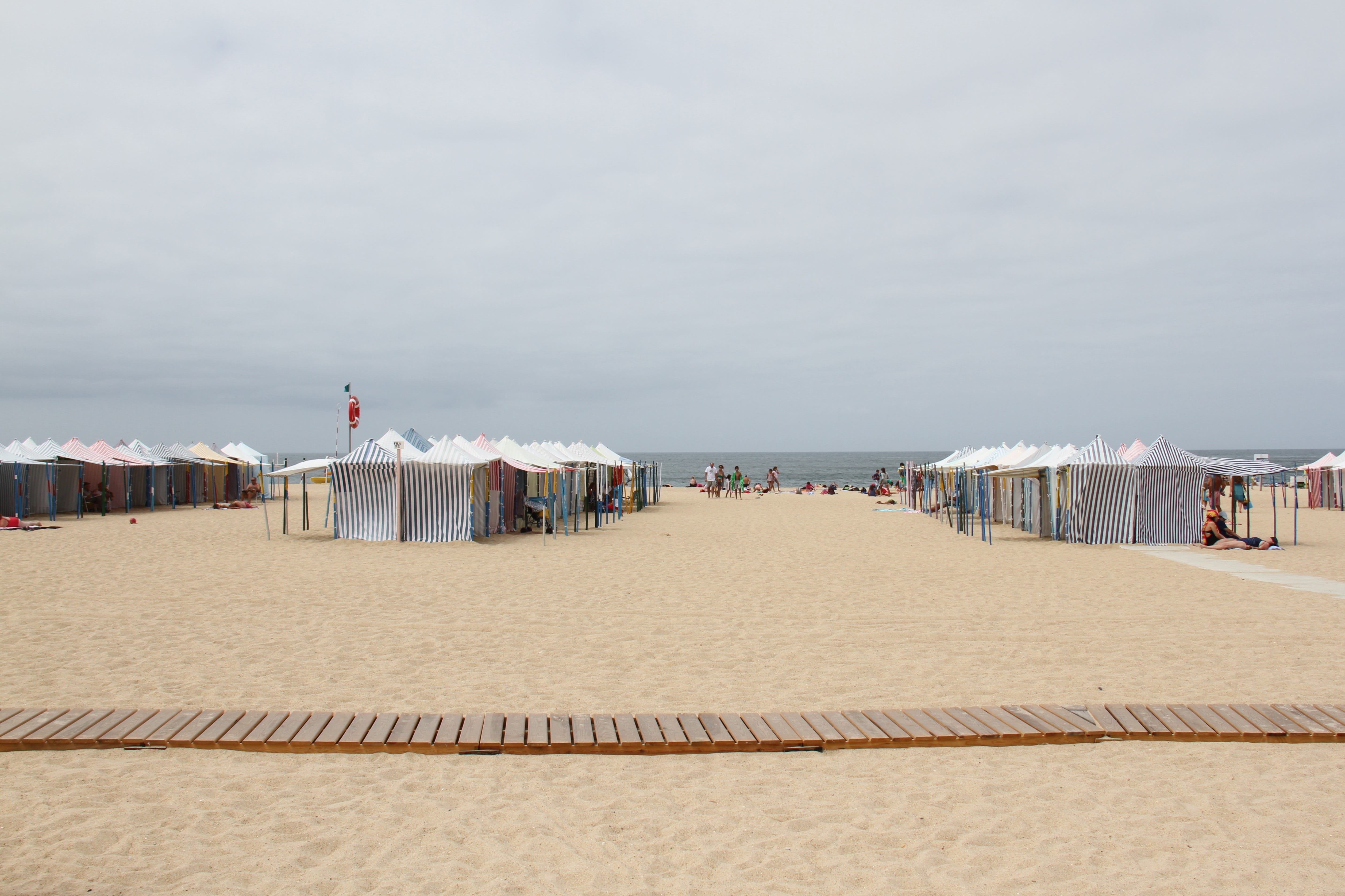 scenics - nature, incidental people, travel, architecture, ocean, horizon, tent, tranquility, sea, nazaré, day, beach, sand, nature, building exterior, HD Wallpaper
