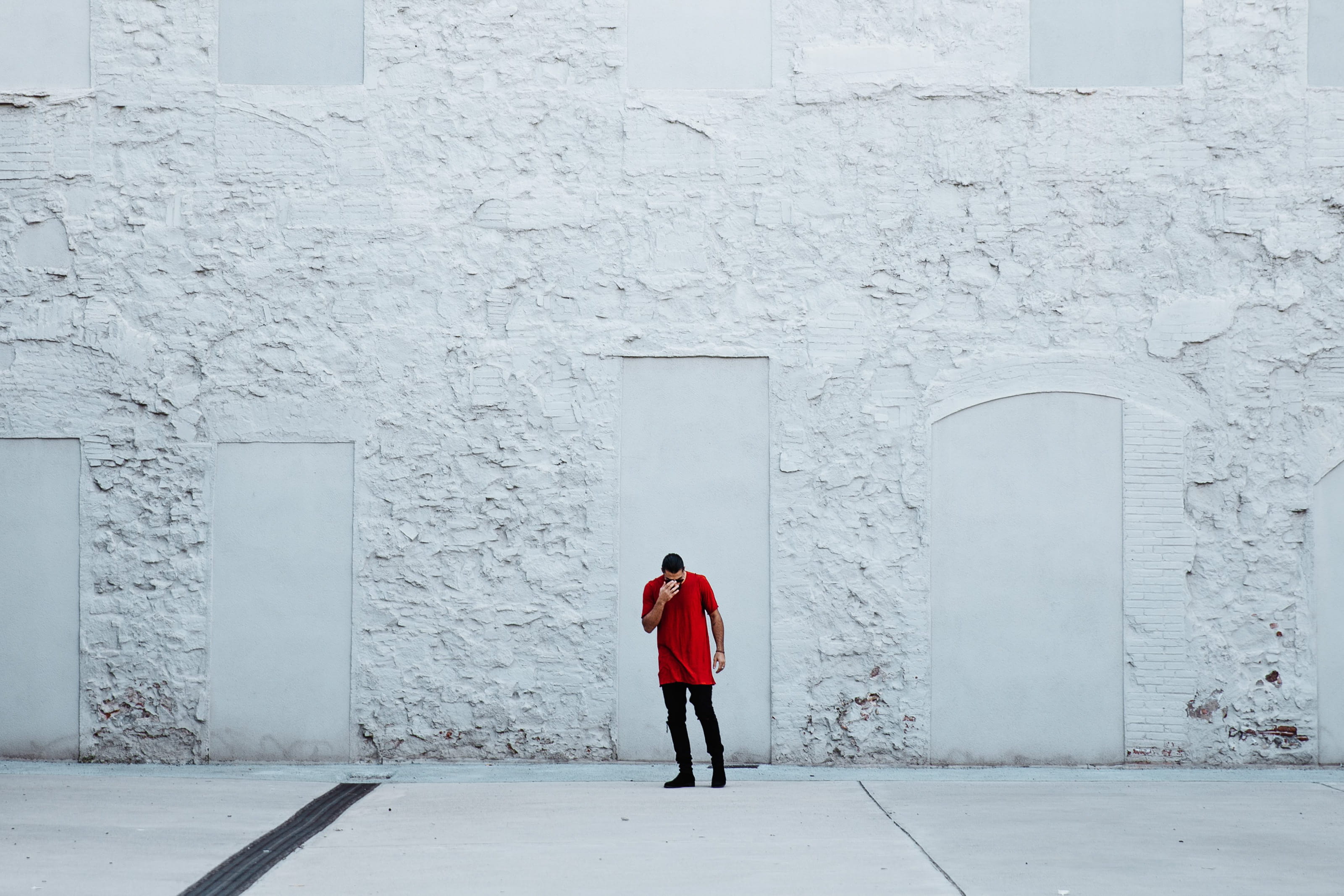 men, architectural column, red, 2K, footwear, textile, person, one person, white color, building, people, expression, warm clothing, casual, sunglasses, HD Wallpaper