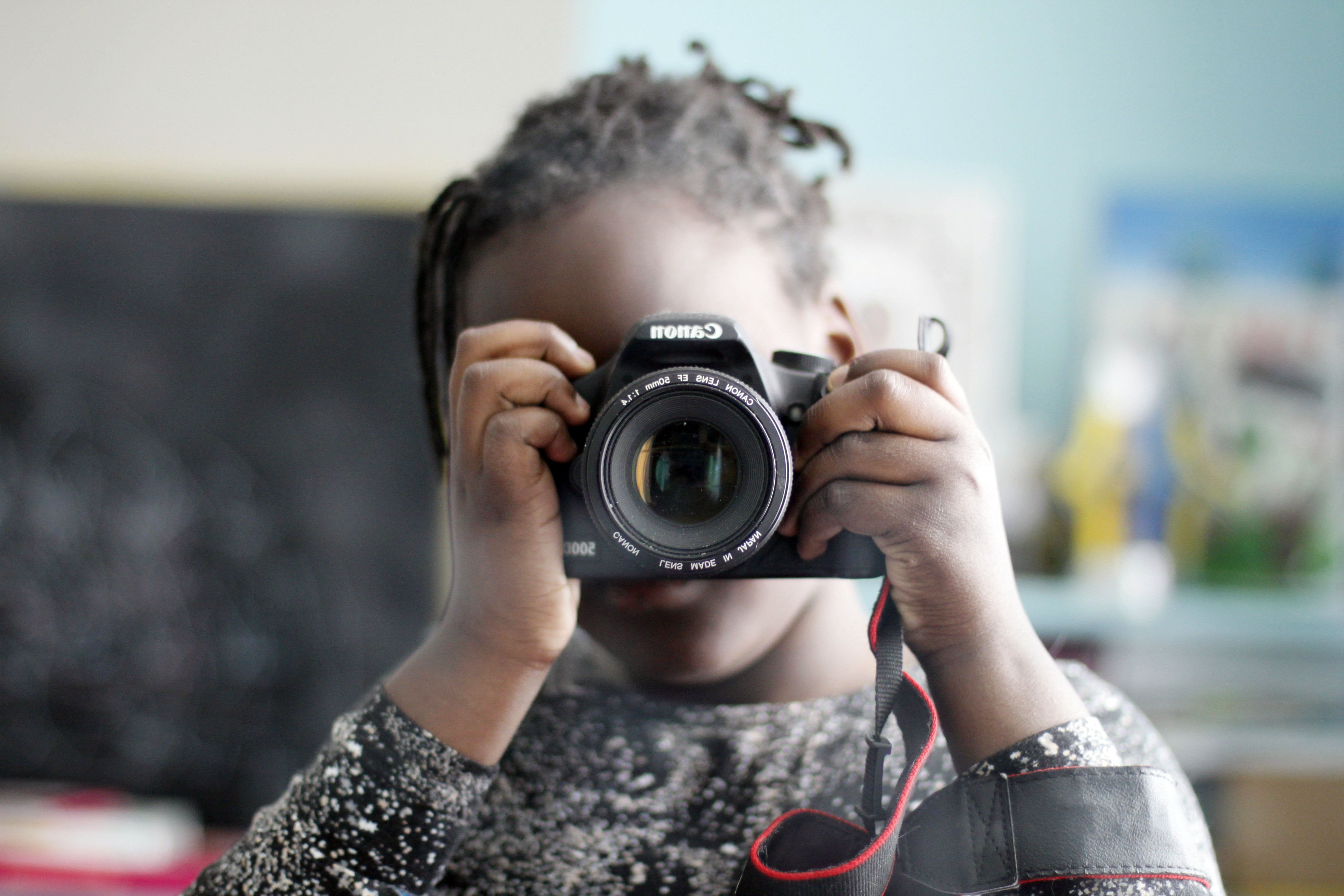 4K, casual clothing, digital camera, looking through an object, hairstyle, obscured face, canon, shift, black skin, photographing, picture, photography, HD Wallpaper
