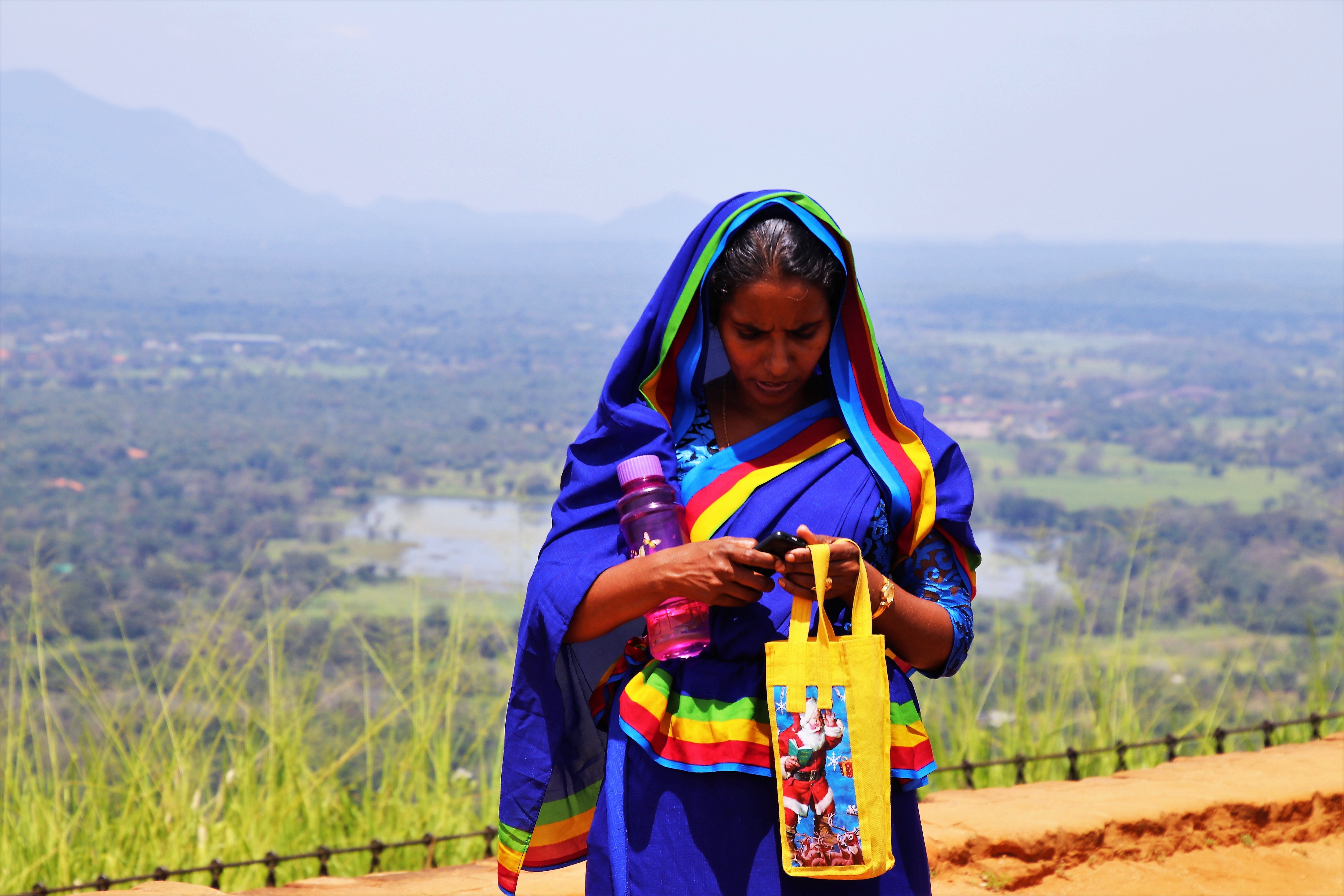 day, real people, holding, sri lanka, leisure activity, lifestyles, scenery, boiling hot, view, scarf, photo, tote, waist up, bag, indian saree, sms, girl, HD Wallpaper