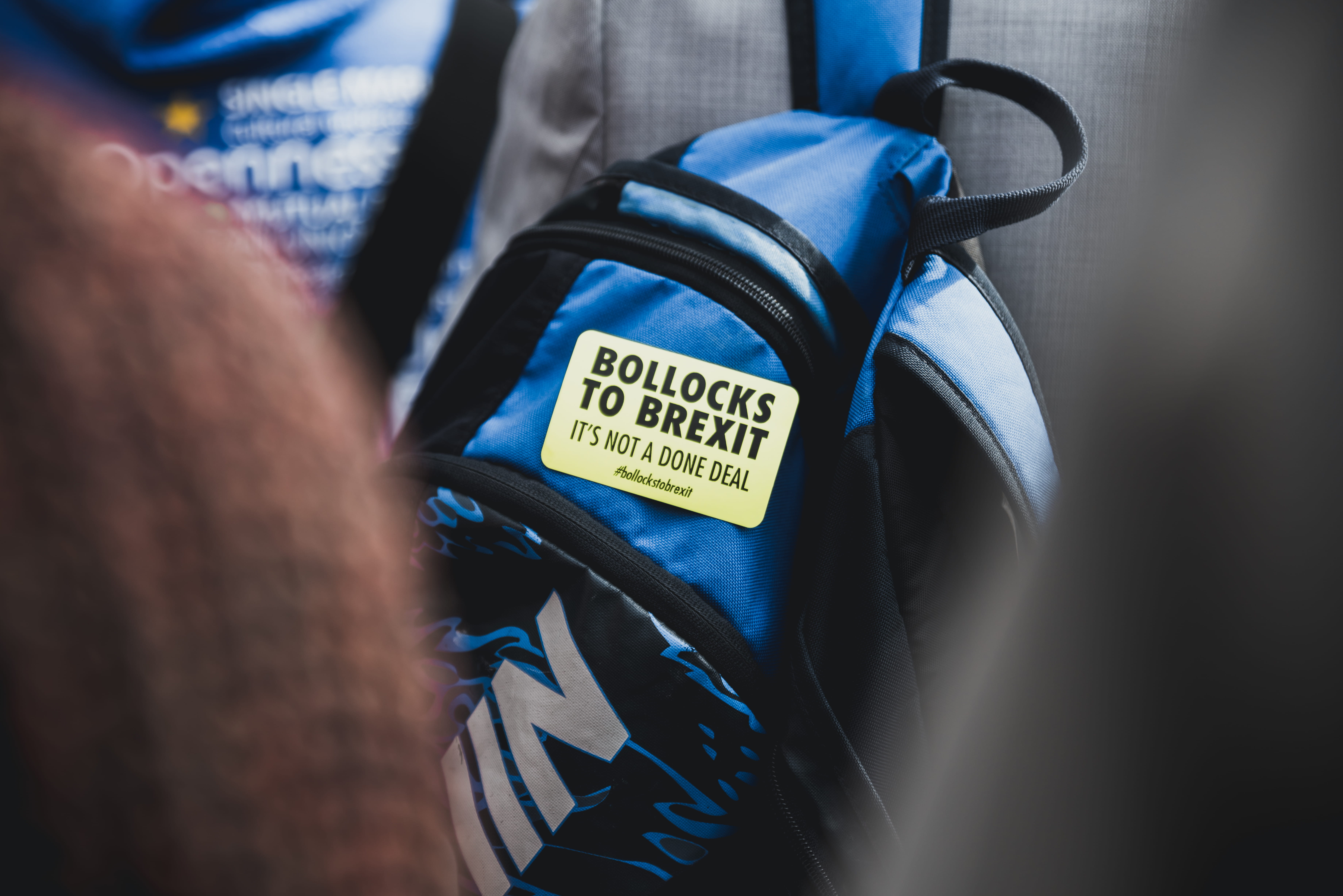 real people, body part, accessories, backpack, brexit, indoors, nike, time, tire, march, bottle, blue, close-up, western script, london, person, black, HD Wallpaper