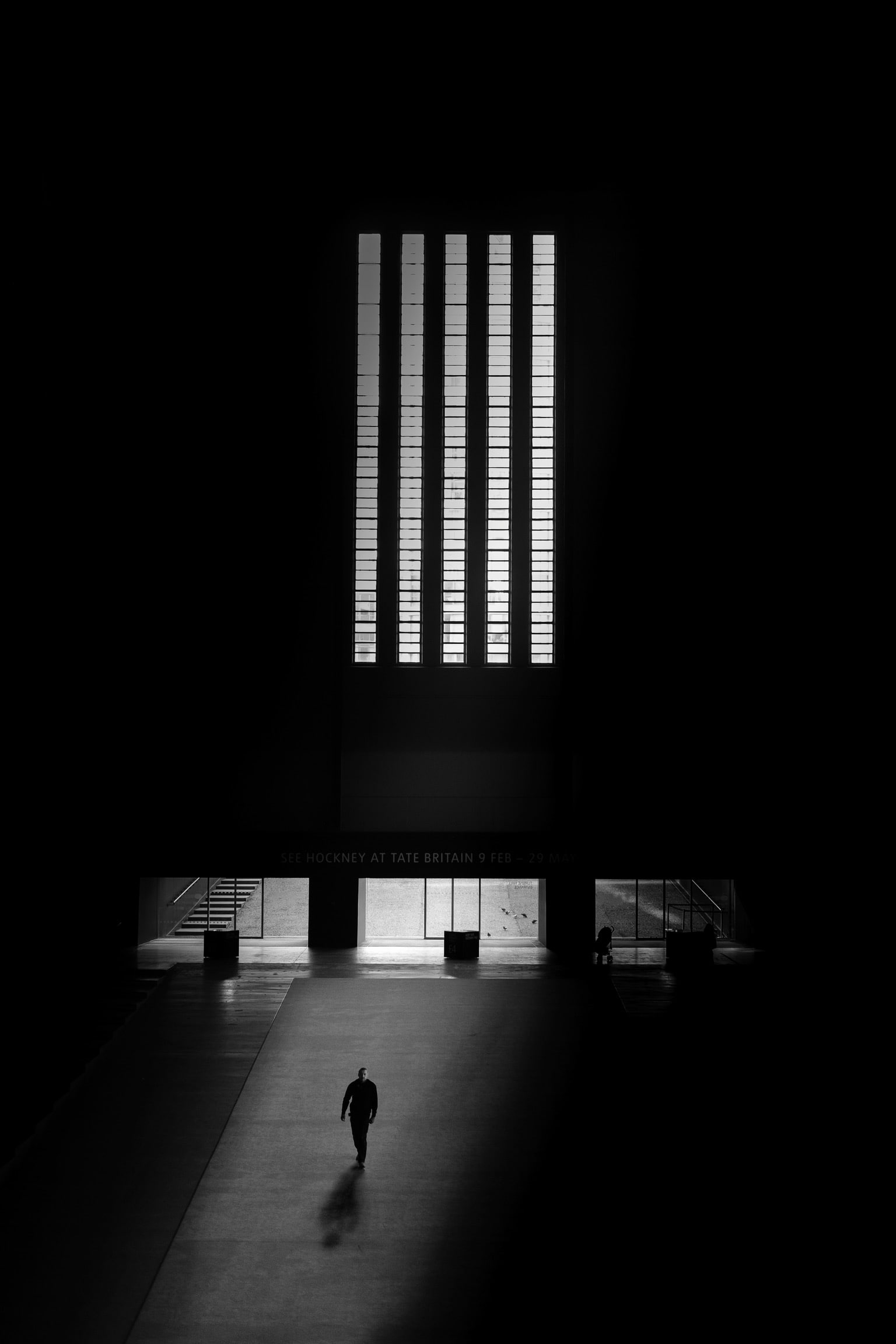 day, photography, copy space, men, real people, building, monochrome, adult, architecture, place of worship, walking, silhouette, built structure, one person, Phone HD Wallpaper