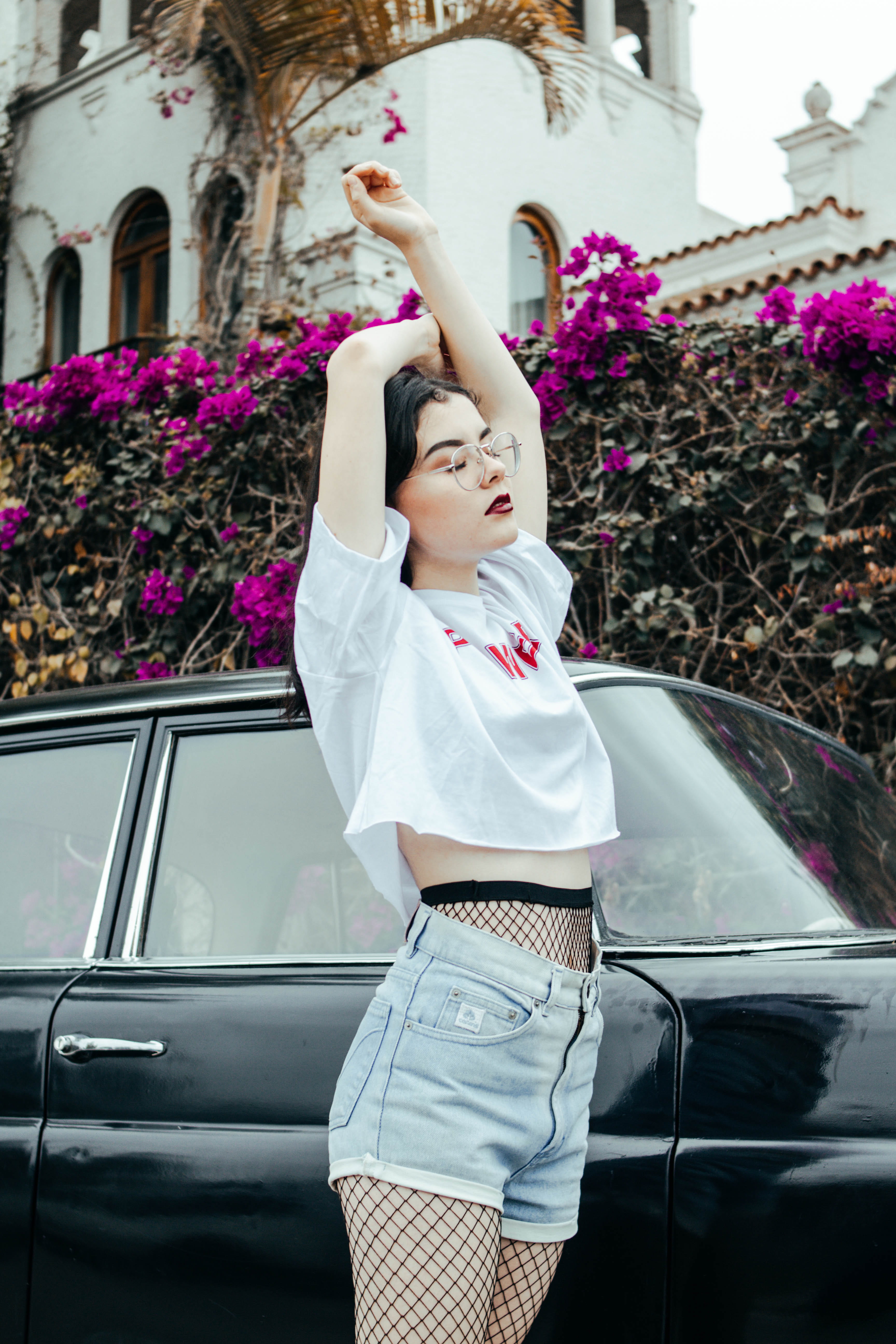 one person, child, hairstyle, stretch, human arm, street photography, day, gray, shorts, purple, white, t-shirt, hands, car, mode of transportation, fashion, Phone HD Wallpaper