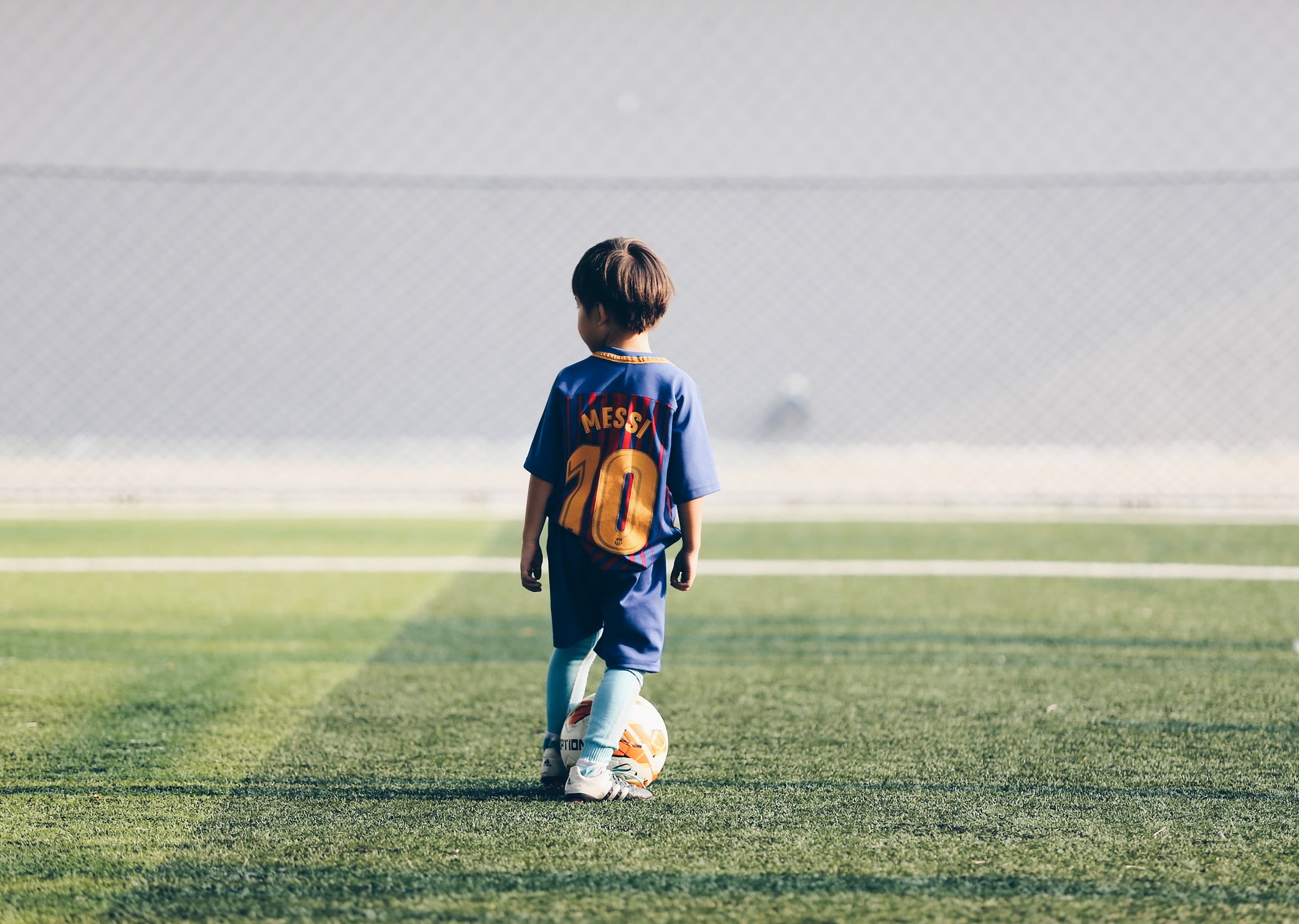 offspring, men, boy, child, lionel, blue, 2K, grass, lawn, ball, leisure activity, football, real people, sport, childhood, football field, s, innocence, HD Wallpaper