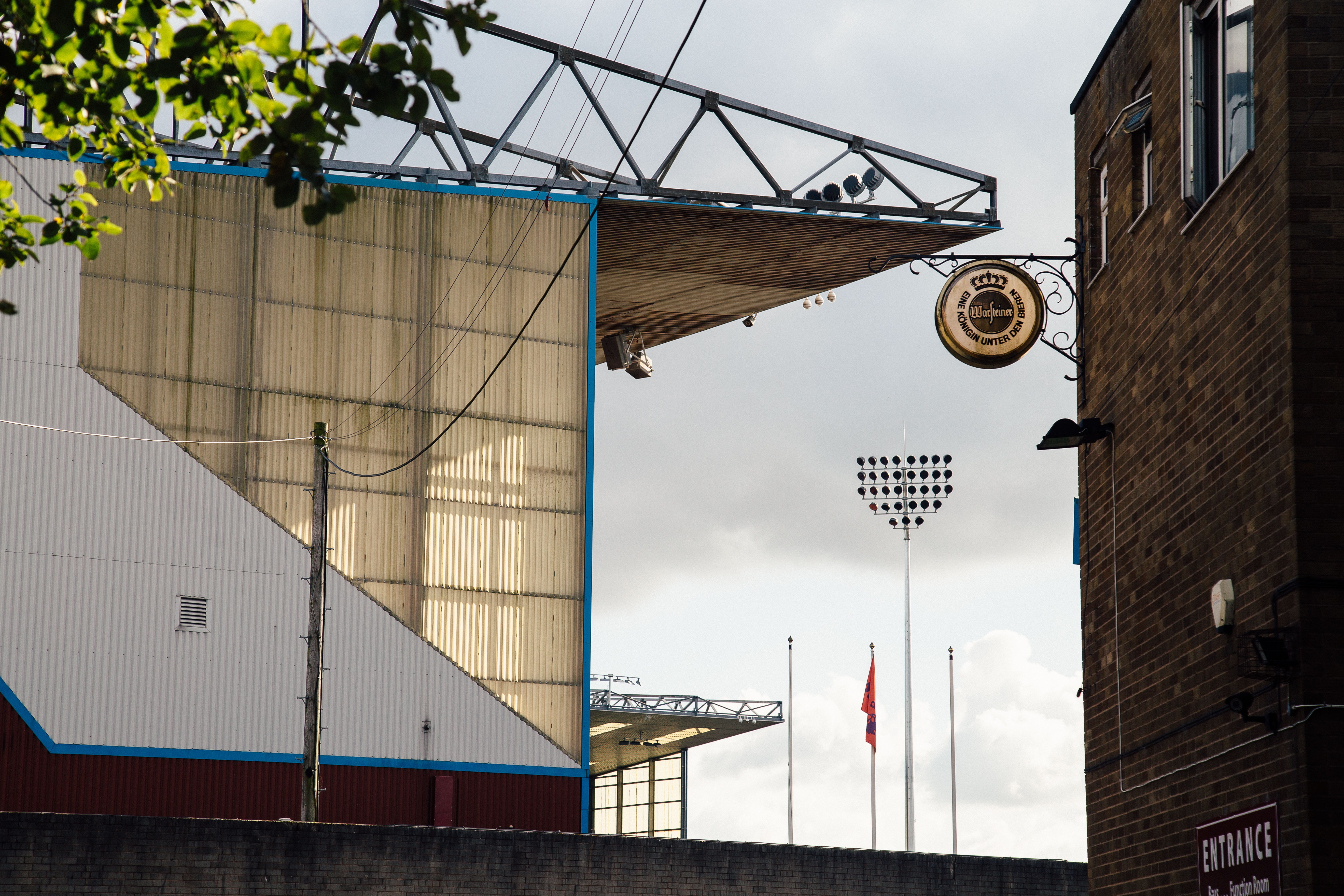 burnley, soccer stadium, day, building, outdoors, low angle view, no people, text, football stadium, architecture, street light, premier league, HD Wallpaper