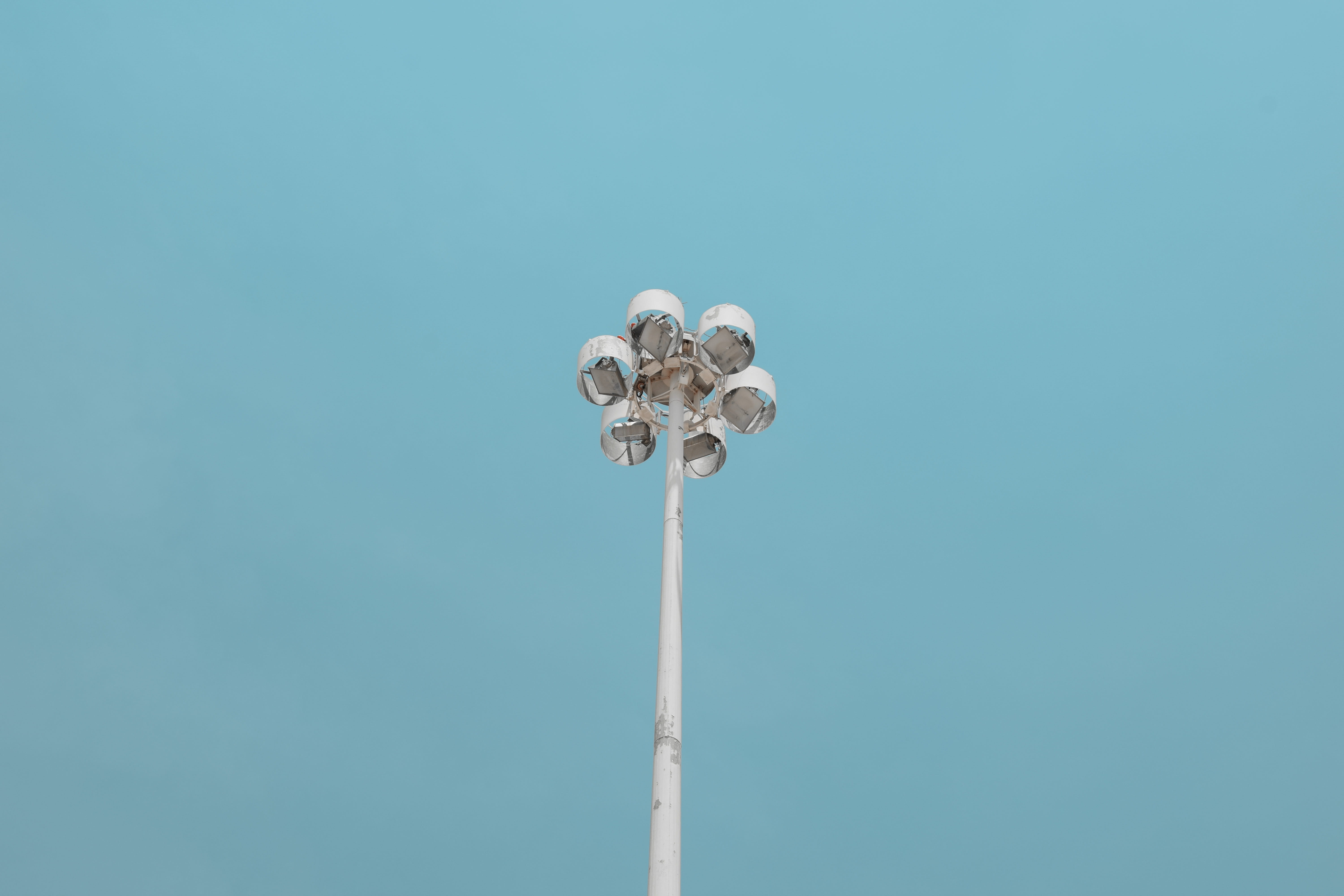 sky, tall - high, outdoors, low angle view, day, space, floodlight, lighting equipment, blue, white, pole, clear sky, high, bulb, copy space, stadium, post, HD Wallpaper