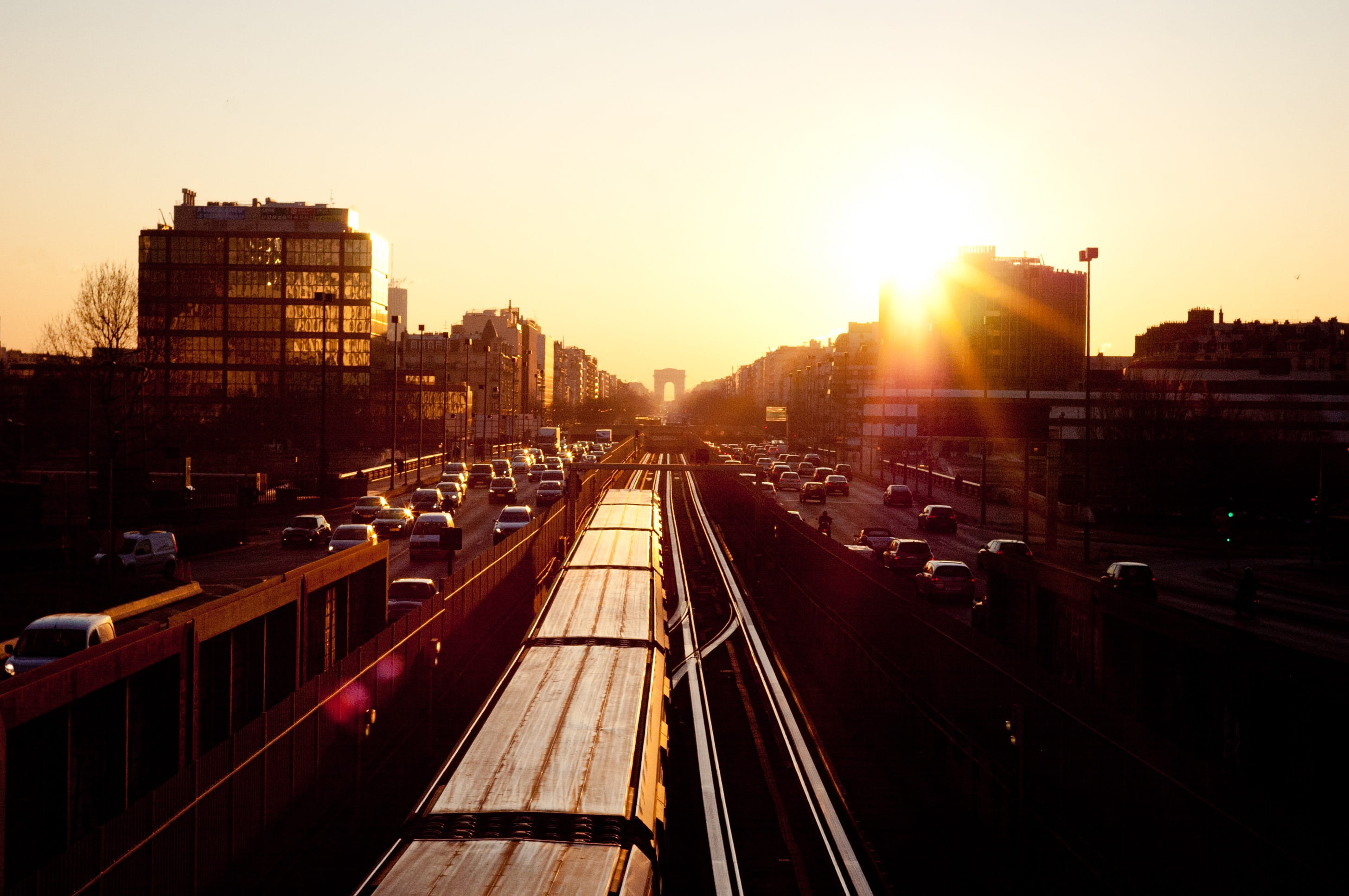 atmospheric phenomenon, skyline, bridge, lens flare, morning, reflection, architecture, sunlight, commute, darkness, building exterior, 2K, train, dusk, HD Wallpaper