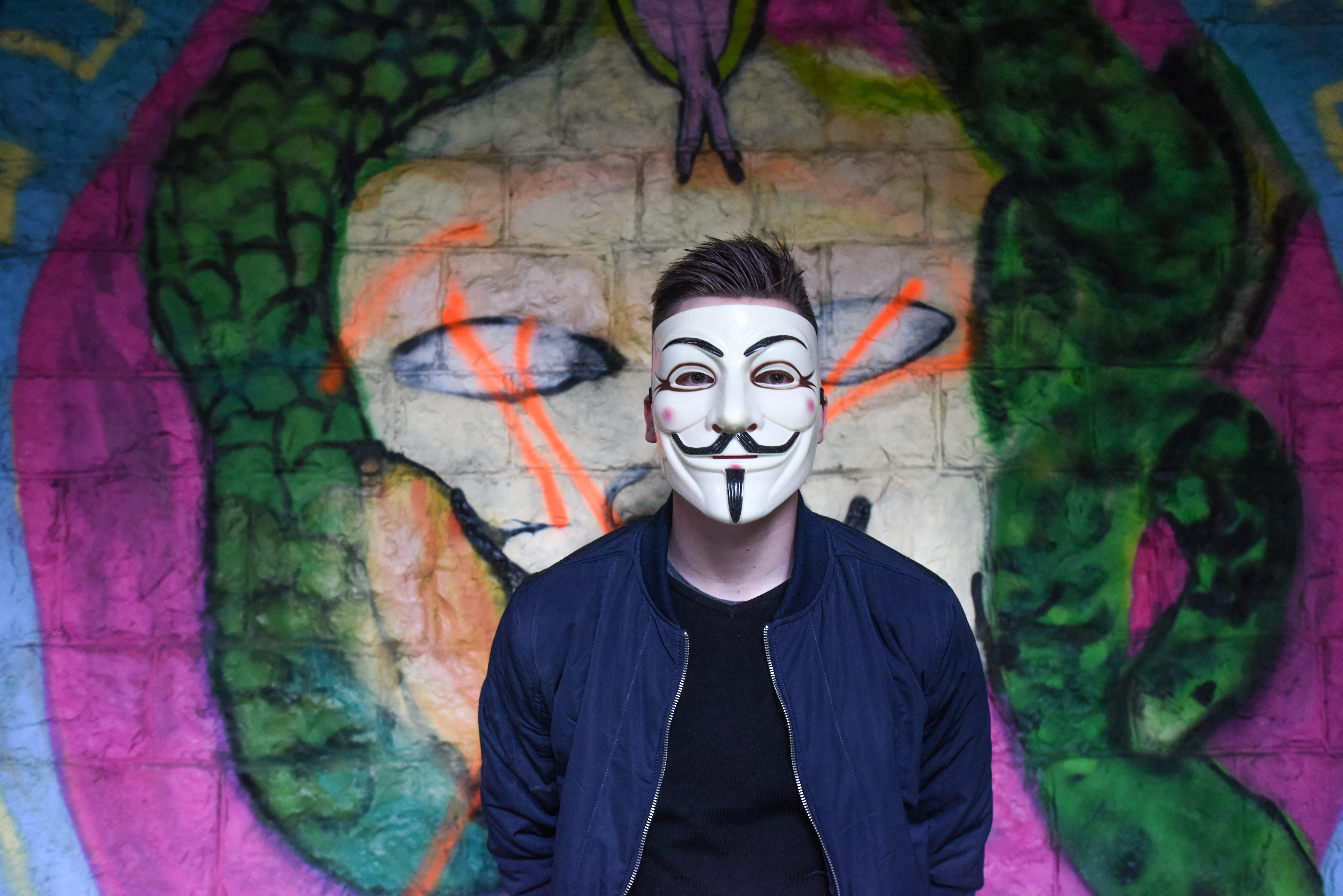 creativity, graffiti, face paint, looking at camera, hacker, mural, casual clothing, standing, man, paint, real people, leisure activity, teenage boys, HD Wallpaper