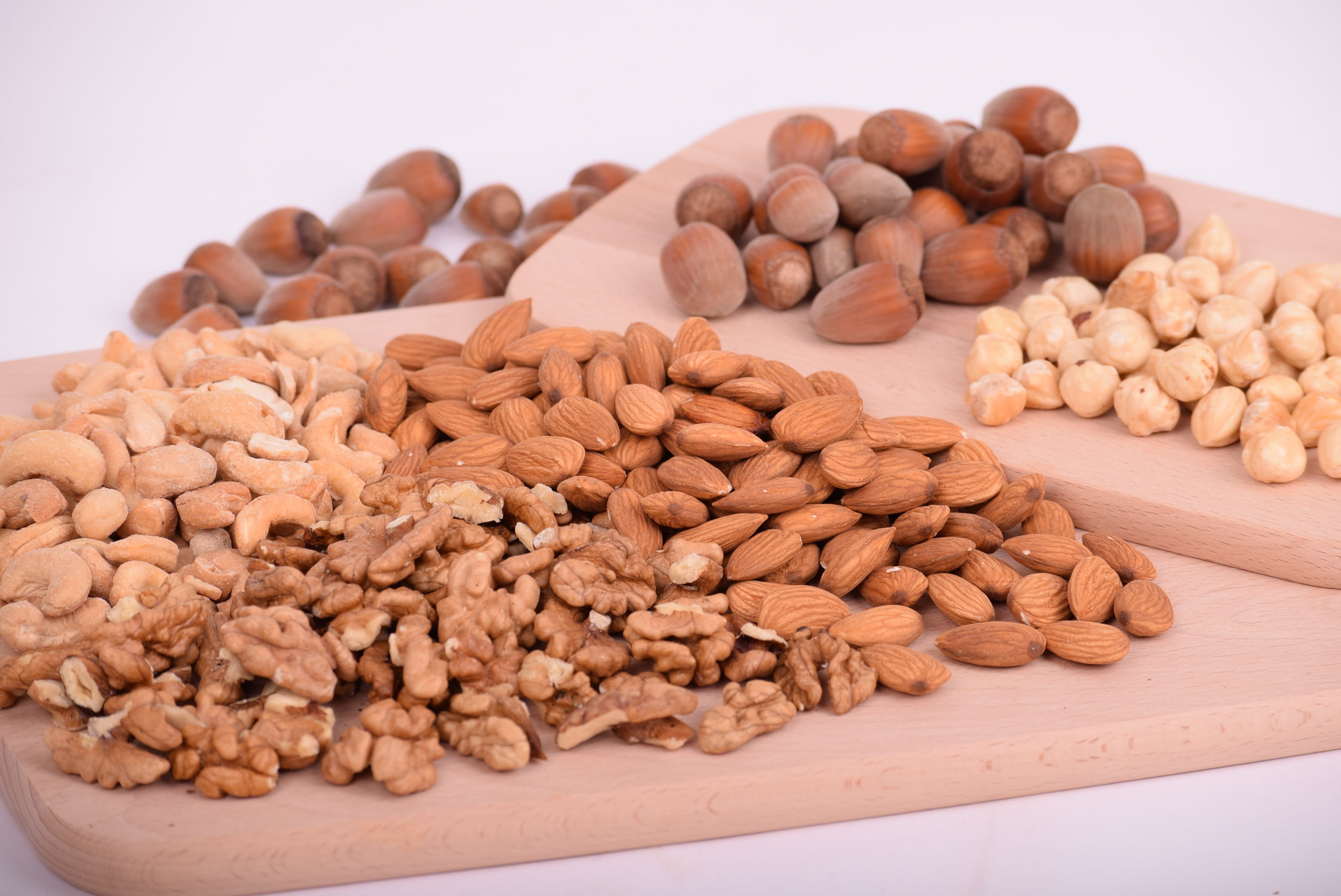 cereal, brown, white background, dieting, freshness, walnut, nut, plate, wooden, walnuts, organic, healthy, no people, wellbeing, abundance, vegetarian, HD Wallpaper