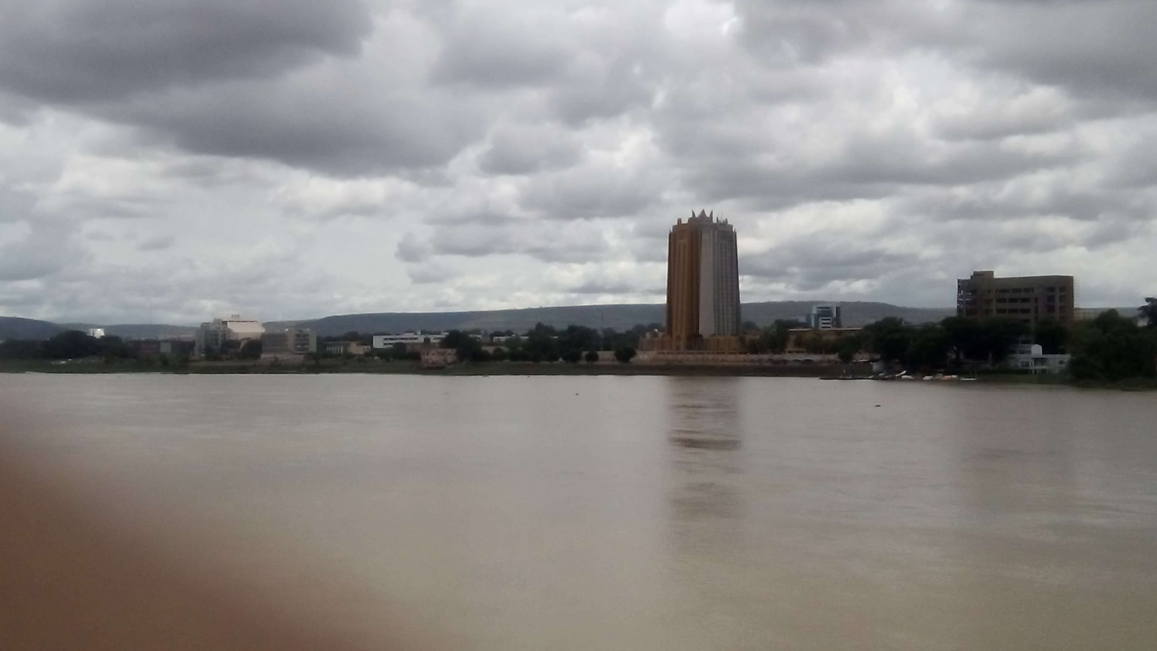 outdoors, no people, skyscraper, day, overcast, bamako, sky, building, building exterior, nature, architecture, environment, city, water, cityscape, cloud - sky, HD Wallpaper