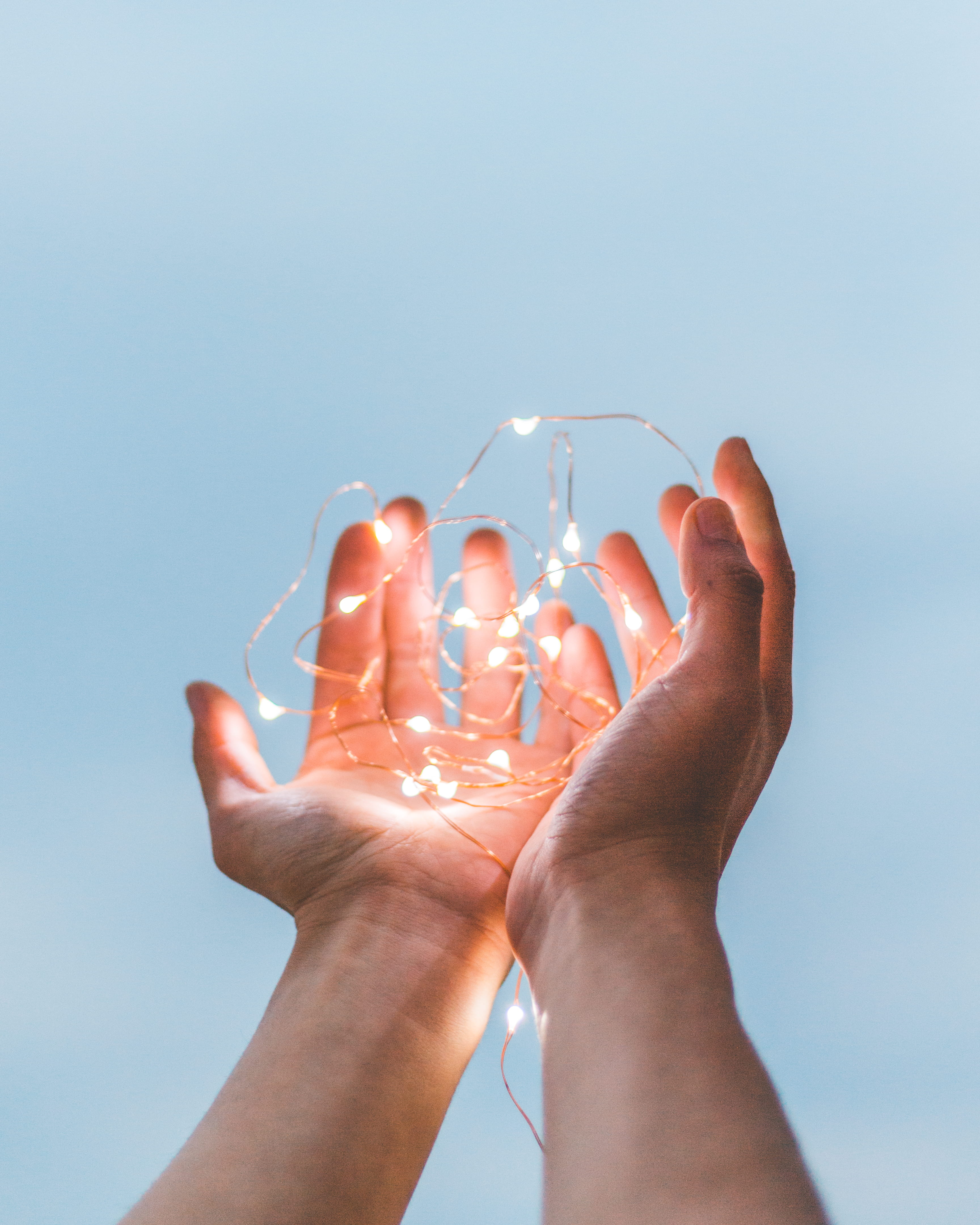 hold, clear sky, lifestyles, digital composite, light, human Hand, fairy lights, beige, blue background, finger, nature, human body part, hand, photo, personal perspective, Phone HD Wallpaper