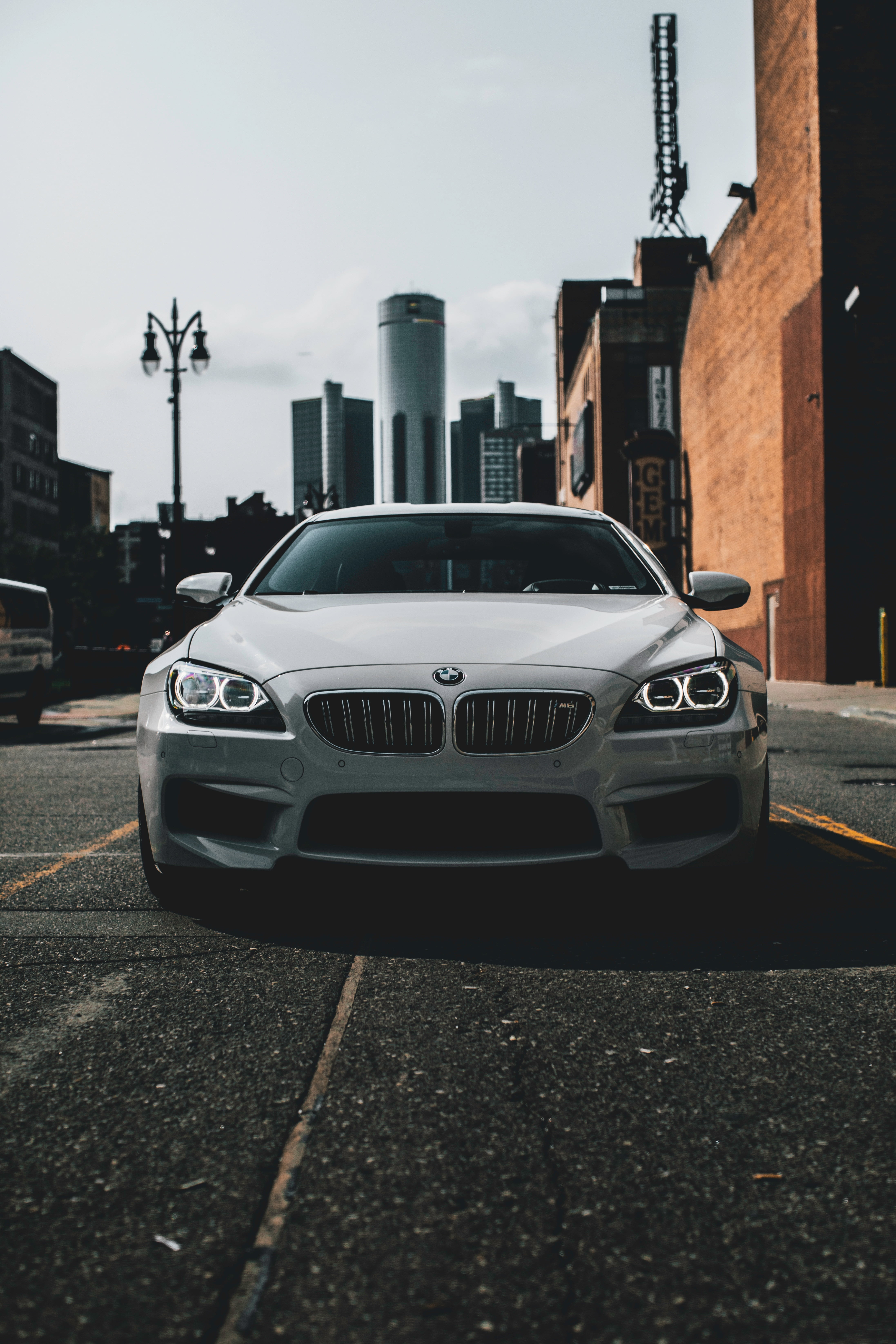 architecture, city, day, road marking, land vehicle, building, front view, bmw m6 gran coupe, skyscraper, street, road, luxury, symbol, transportation, Phone HD Wallpaper