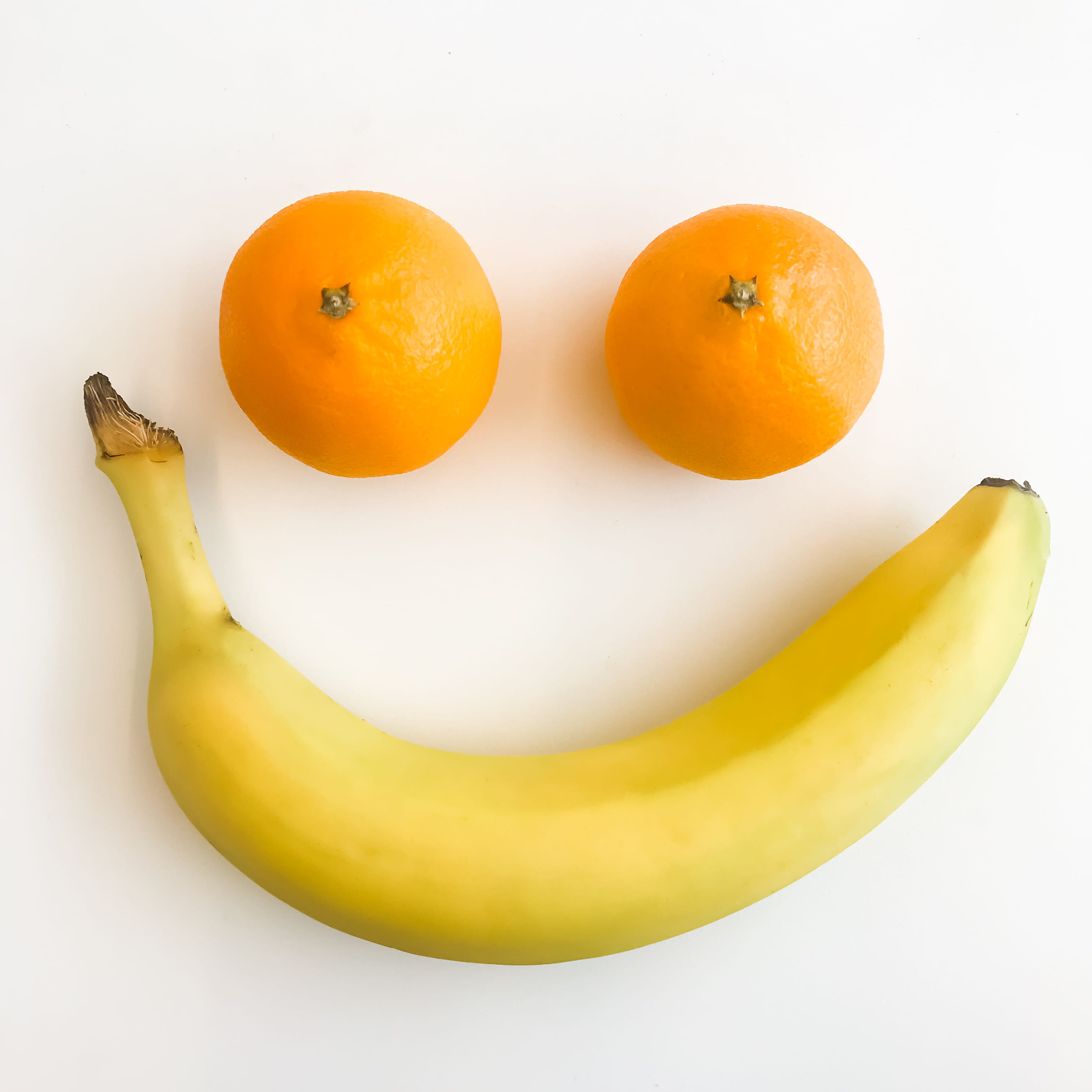 freshness, yellow, face, ripe, no people, close-up, pasadena, white background, two objects, studio shot, banana, food and drink, indoors, wellbeing, food, Phone HD Wallpaper