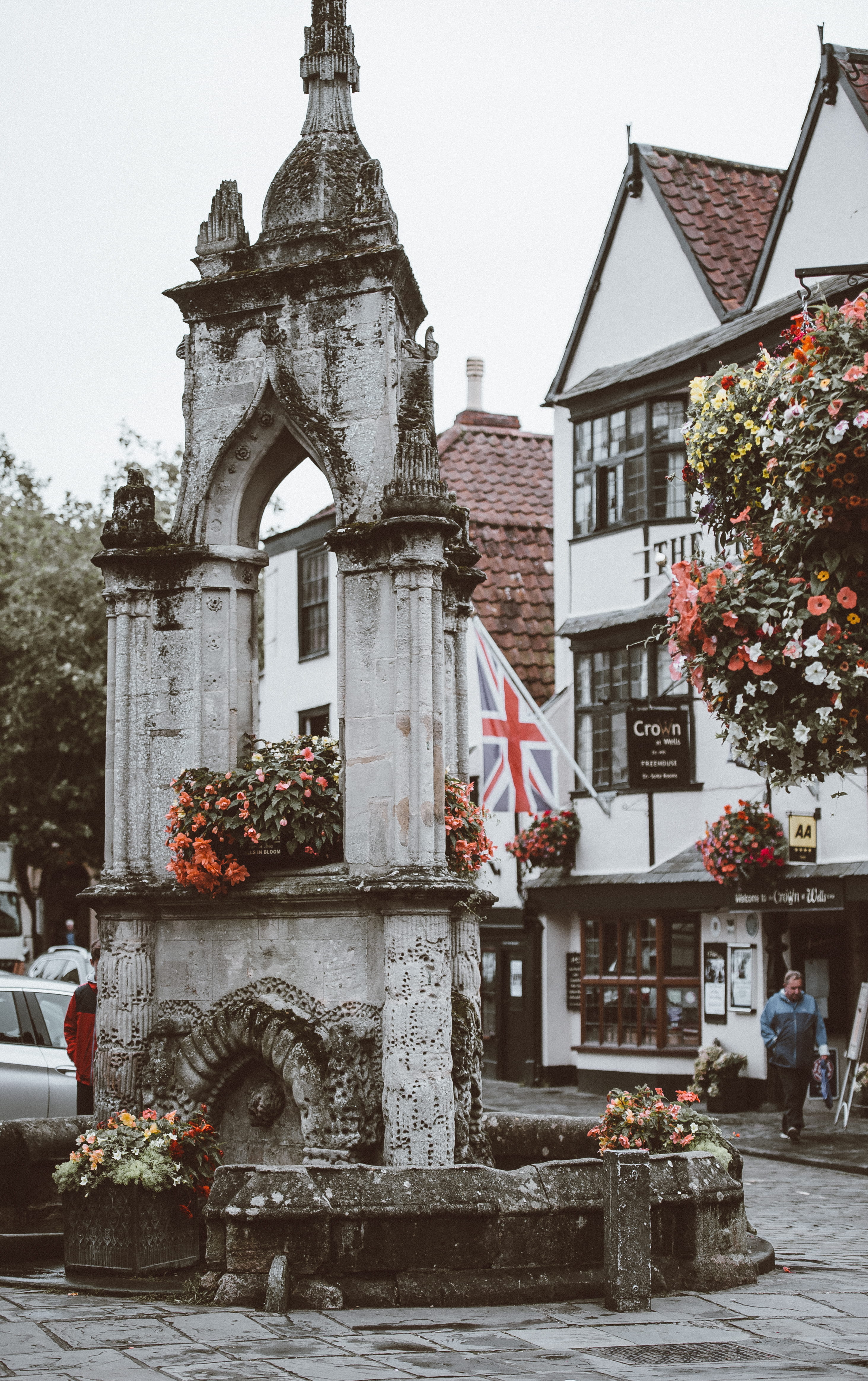 architecture, 4K, wells, nature, outdoors, flowers, day, built structure, water, wall, gray, fuzz, plant, stone, inn, centre, village, religion, building exterior, Phone HD Wallpaper