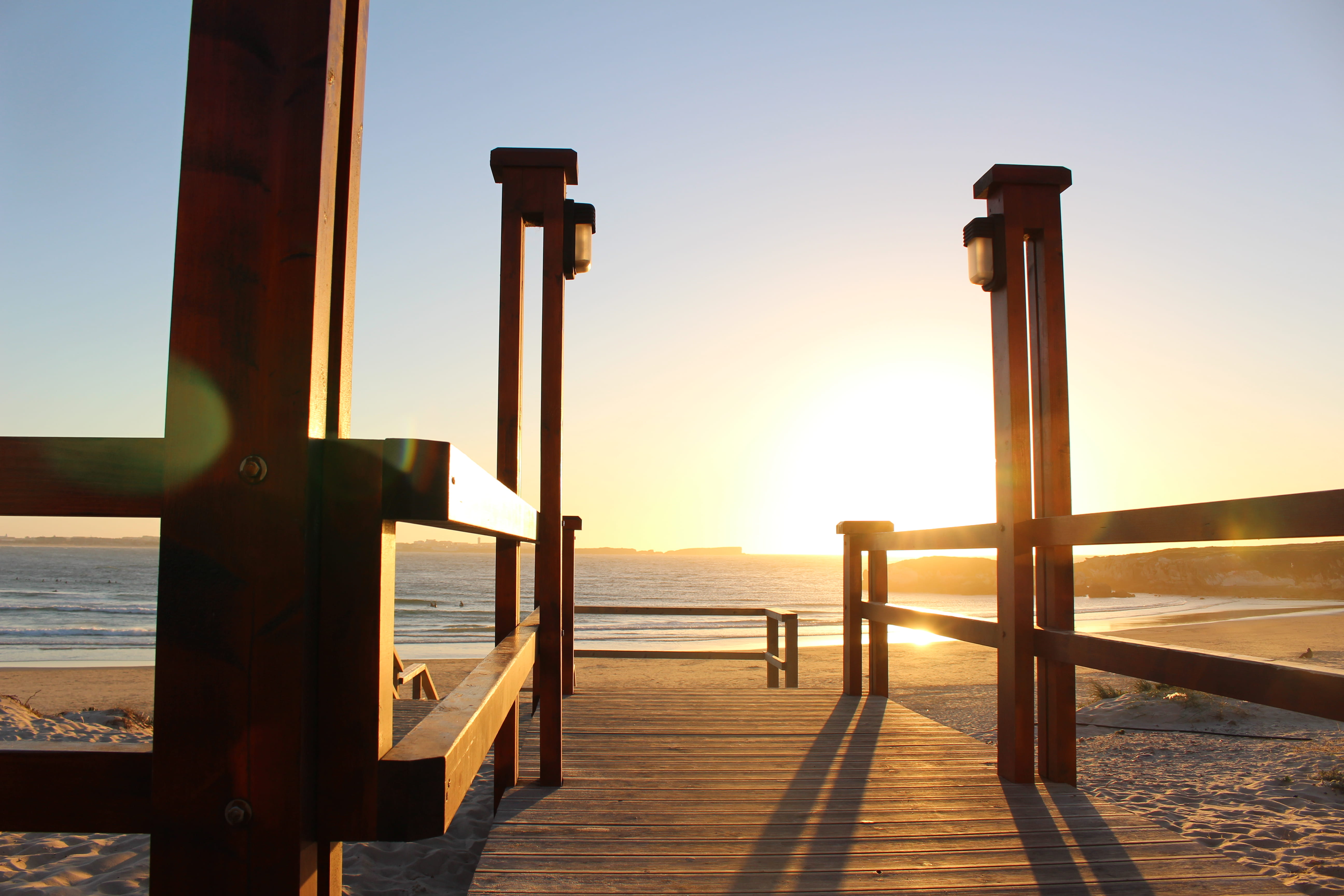 sunlight, nature, railing, beauty in nature, portugal, sun, post, tranquility, 5K, ferrel, sky, outdoors, no people, pier, stairs, wooden post, clear sky, HD Wallpaper