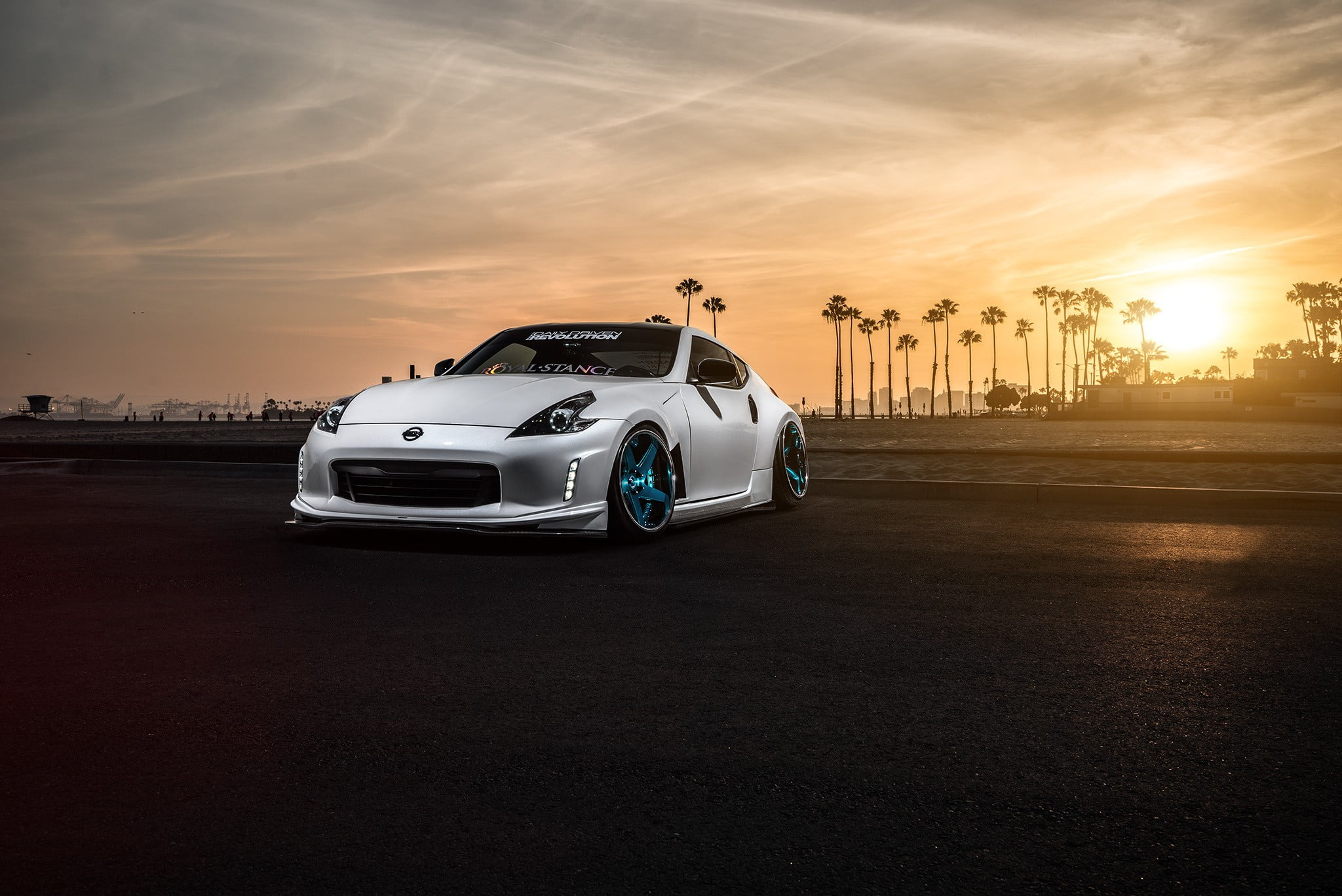 sky, 370Z, road, 1080P, no people, motion, city, nature, transportation, architecture, hatchback, building exterior, door, palm trees, sunlight, beauty in nature, HD Wallpaper