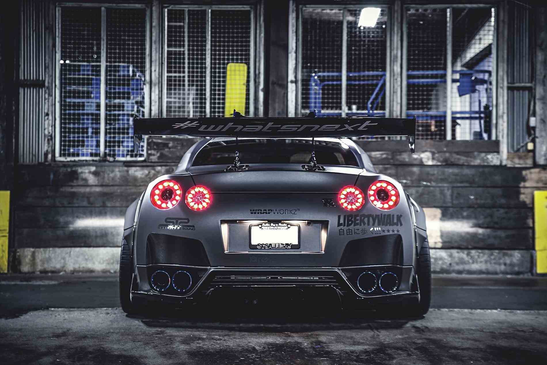 720P, building, built structure, lighting equipment, wheel, outdoors, city, mode of transportation, liberty, nissan, motor vehicle, car, close-up, tail light, HD Wallpaper