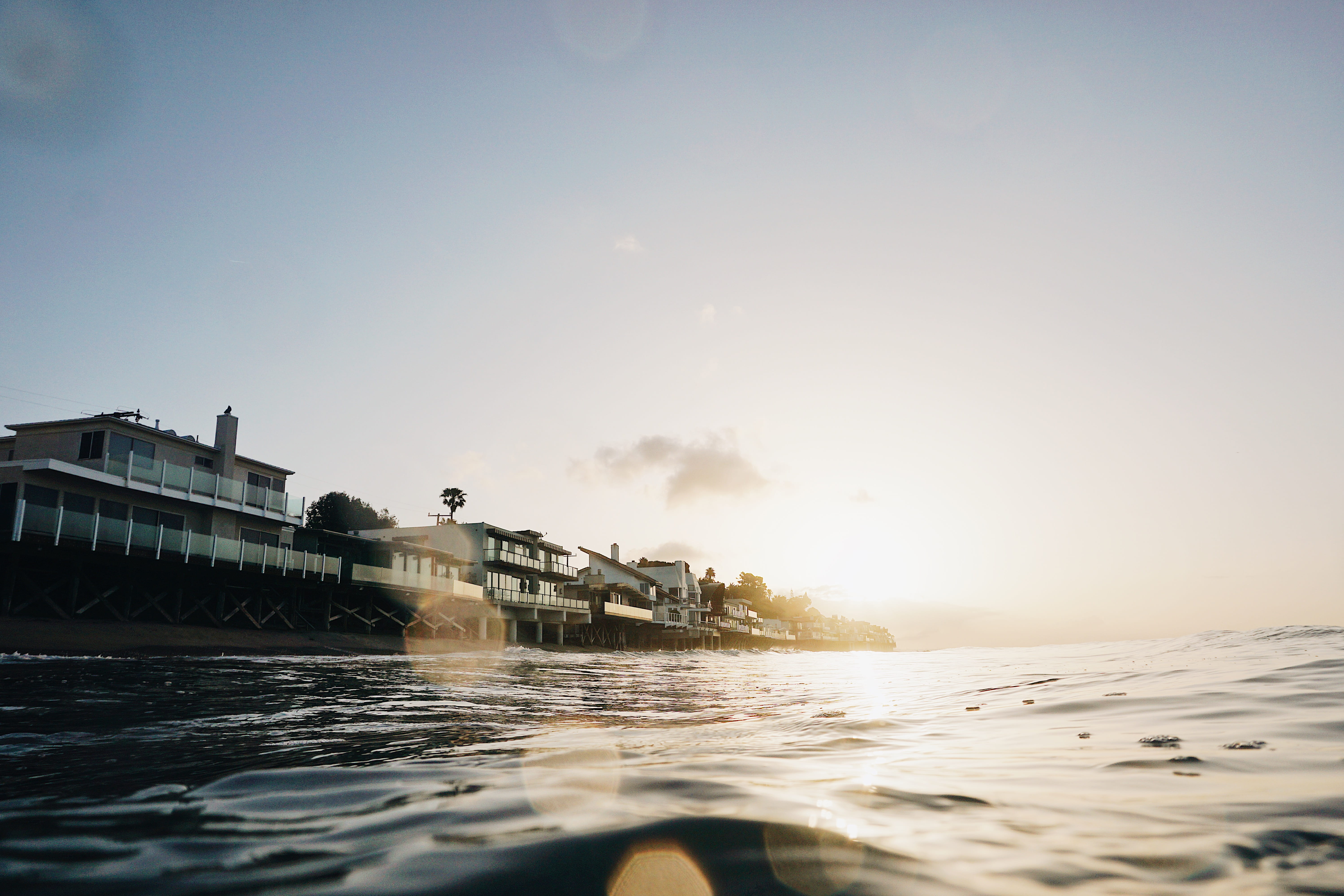 sun, sea, malibu, daytime, 5K, cloud - sky, surf, landscape, beach, sun light, architecture, sunlight, nature, beach home, near, passenger craft, outdoors, HD Wallpaper
