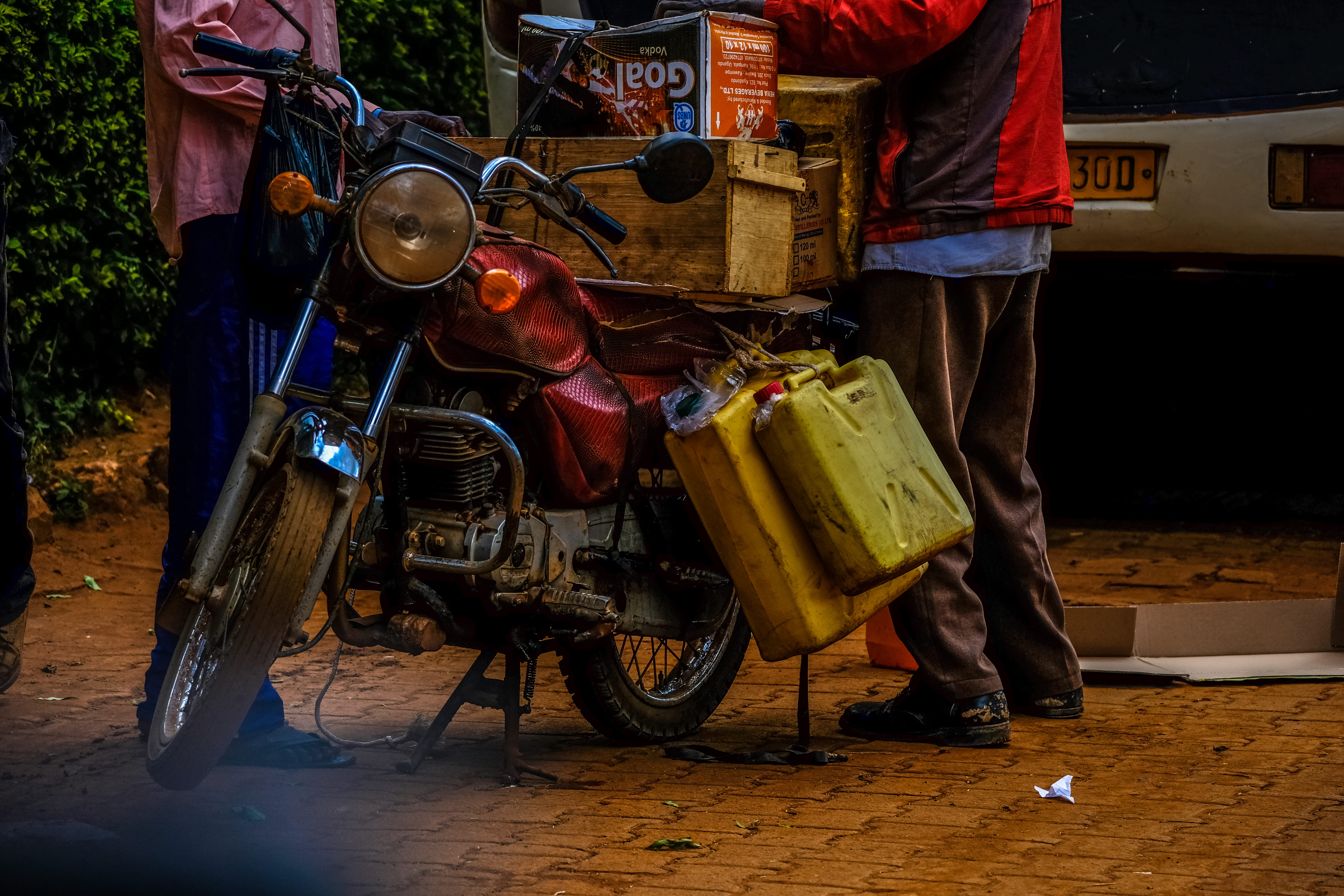 outdoors, city, men, wheel, mode of transportation, headlight, vehicle, standing, low section, path, light, lifestyles, person, people, engine, street, HD Wallpaper