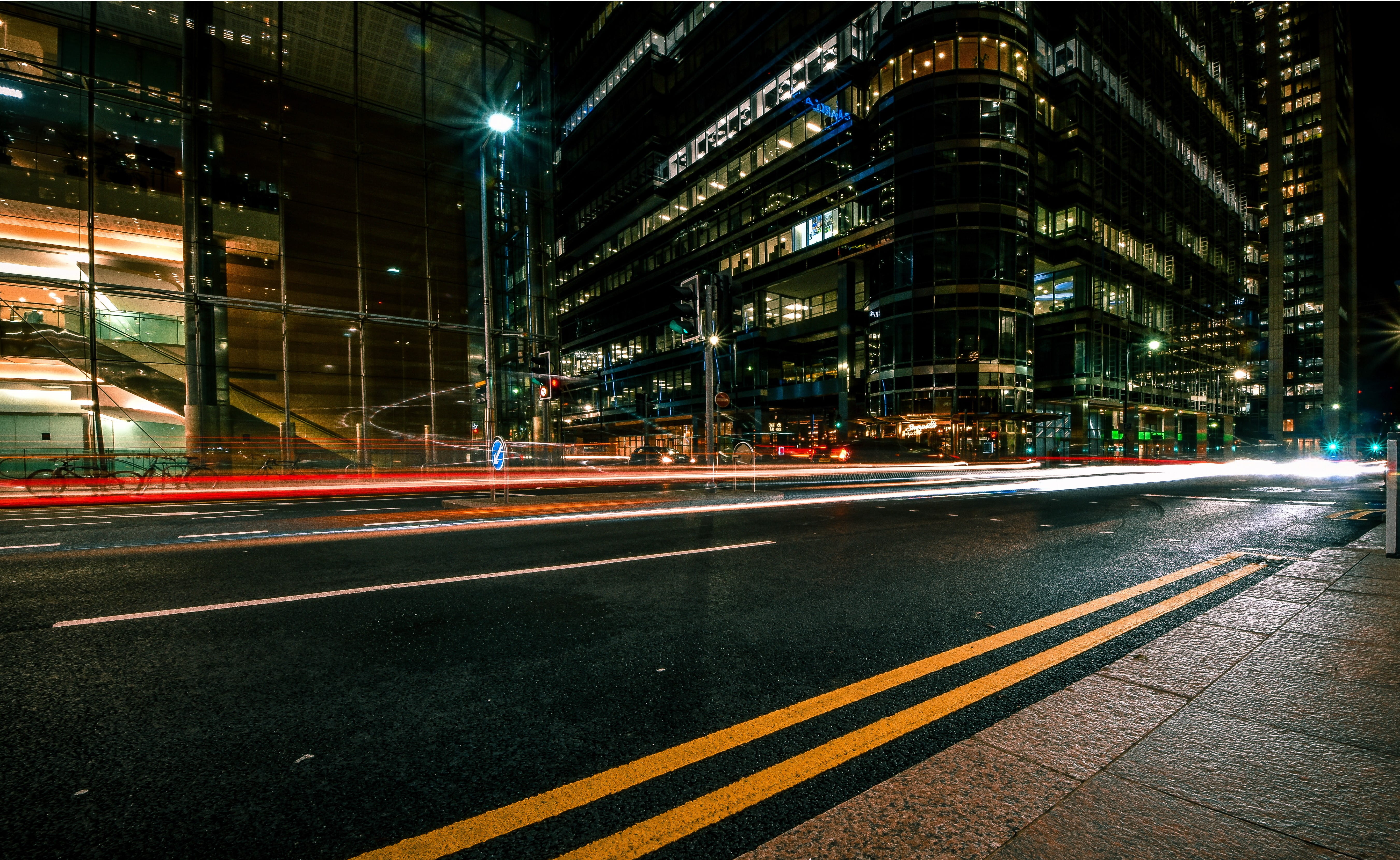 financial district, time, illuminated, light trail, pavement, lines, no people, 5K, nightime, skyscraper, streetlamp, built structure, manmade, traffic, HD Wallpaper