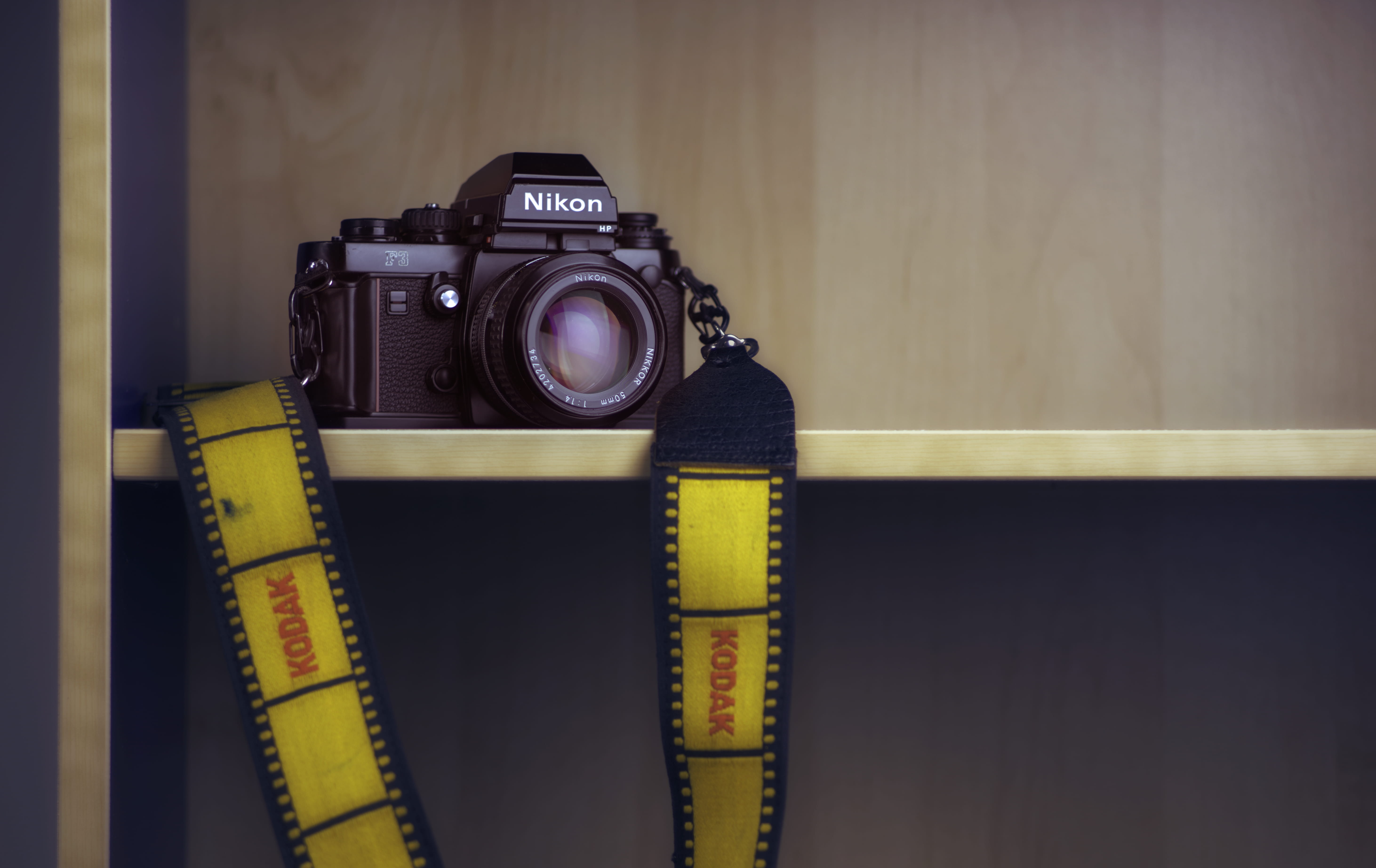 text, digital camera, close-up, lens - optical instrument, photographic equipment, nikkor, table, photographing, no people, black, japan, film, usa, photography themes, HD Wallpaper