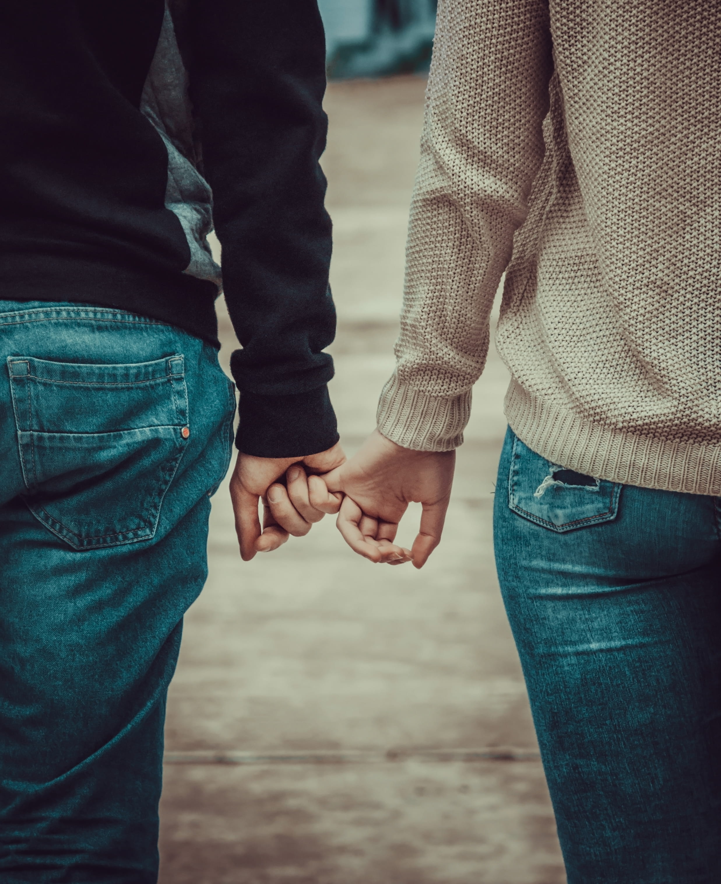 focus on foreground, holding hands, people, bonding, casual clothing, two people, holding, jeans, men, couple - relationship, togetherness, love, daytime, Phone HD Wallpaper