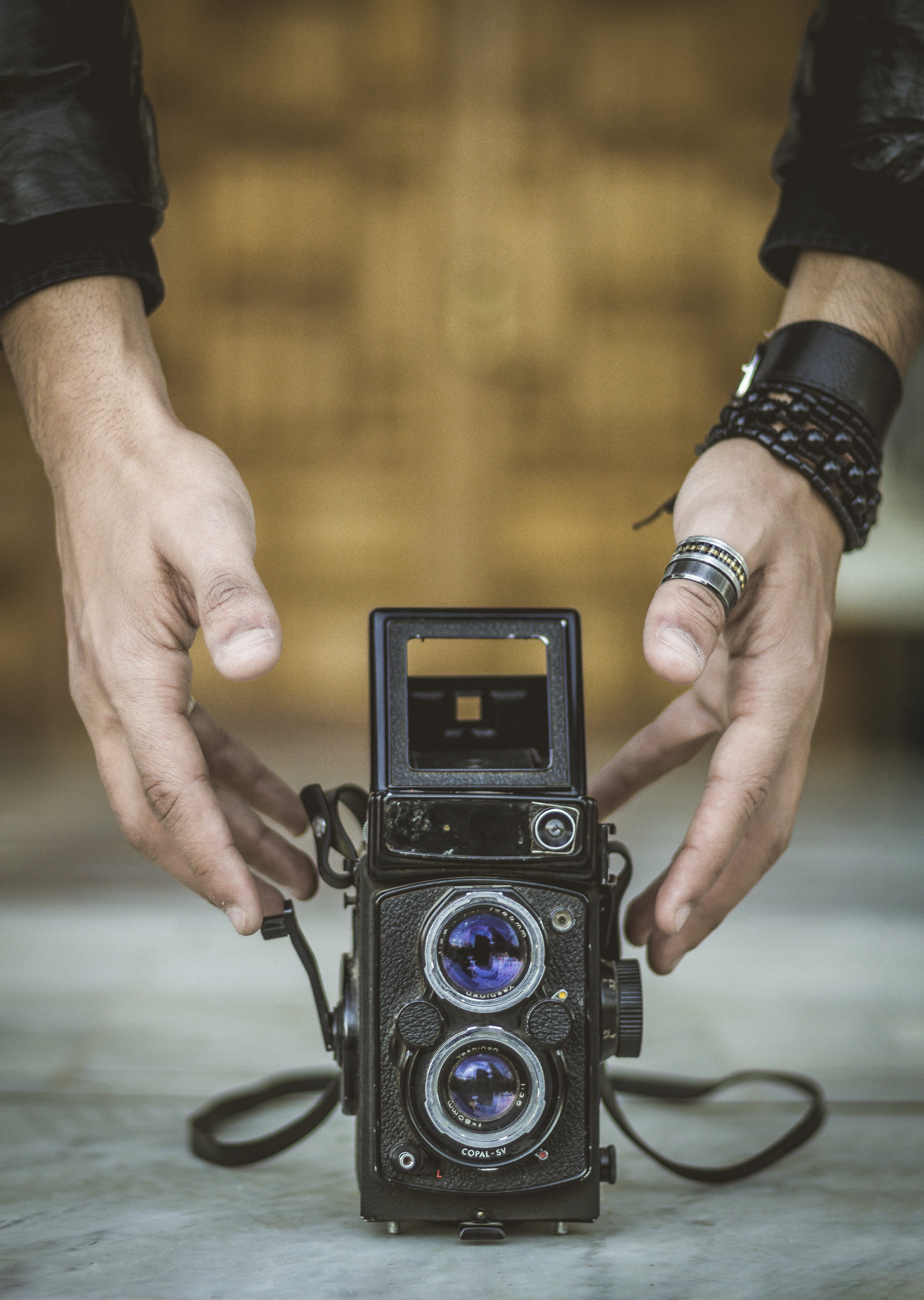 real people, holding, video camera, shelf, photography themes, electronics, human hand, pc, vintage, spiral, machine, technology, wristwatch, low section, Phone HD Wallpaper