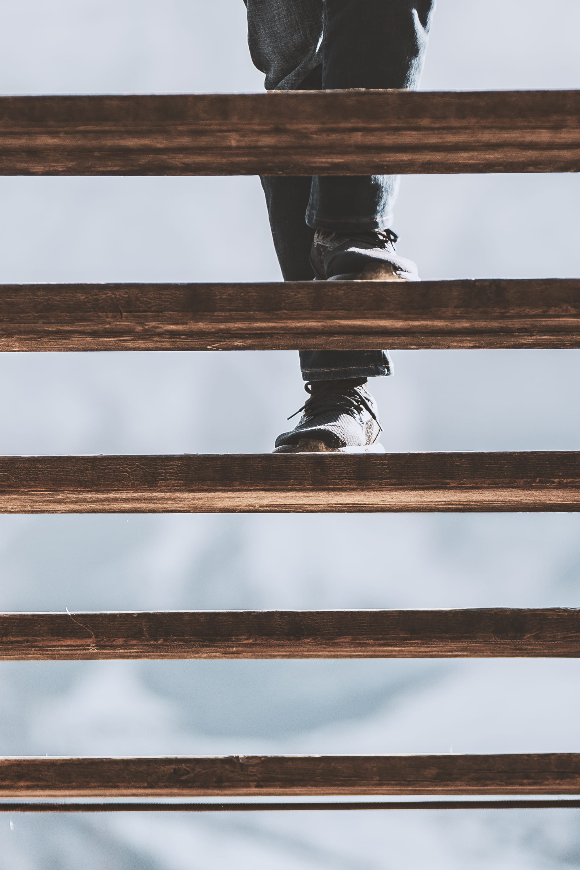 low angle view, up, wood - material, wooden, walk, 2K, standing, day, one person, railing, nature, human limb, staircase, stepping, low section, person, Phone HD Wallpaper