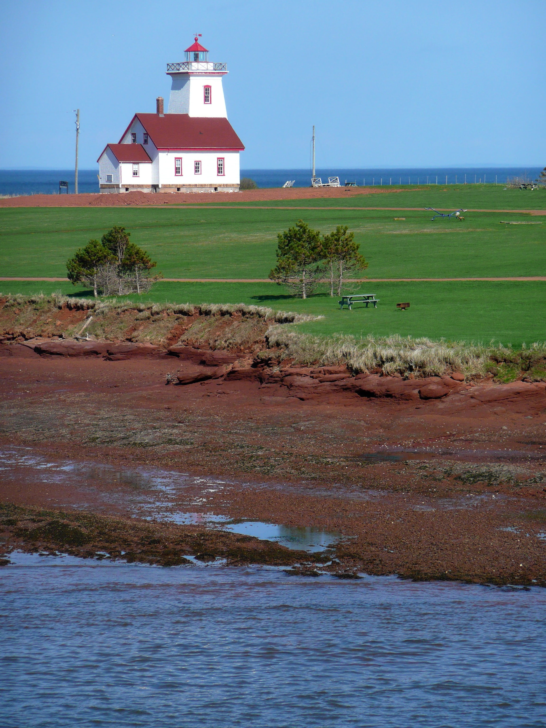 lighthouse, sea, canada, building, land, red soil, outdoors, building exterior, built structure, prince edward island, landscape, water, day, waterfront, Phone HD Wallpaper