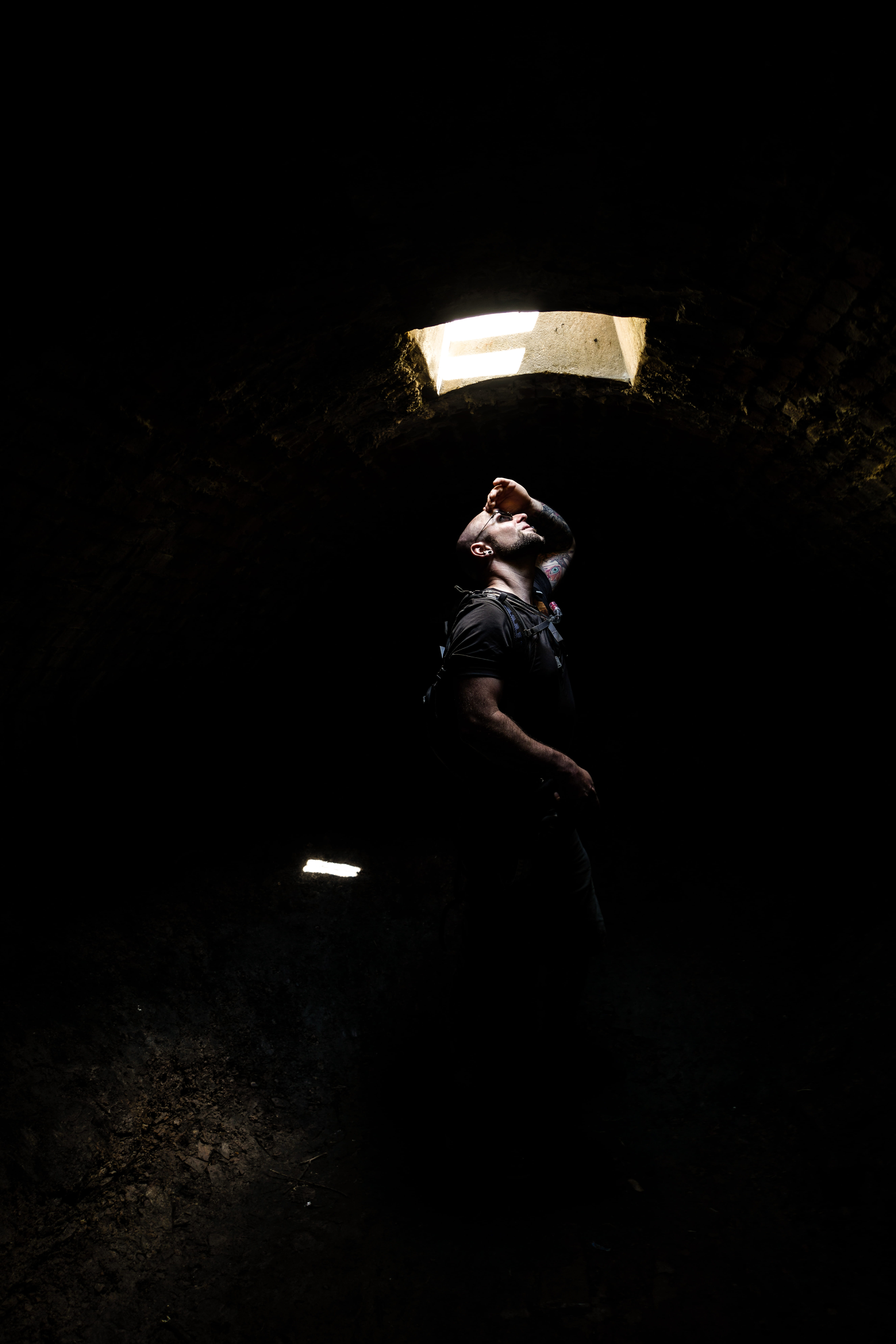 male, full length, night, looking up, man, dark, front view, indoors, glasses, tunnel, human, contemplation, window, people, young adult, men, calke abbey, Phone HD Wallpaper