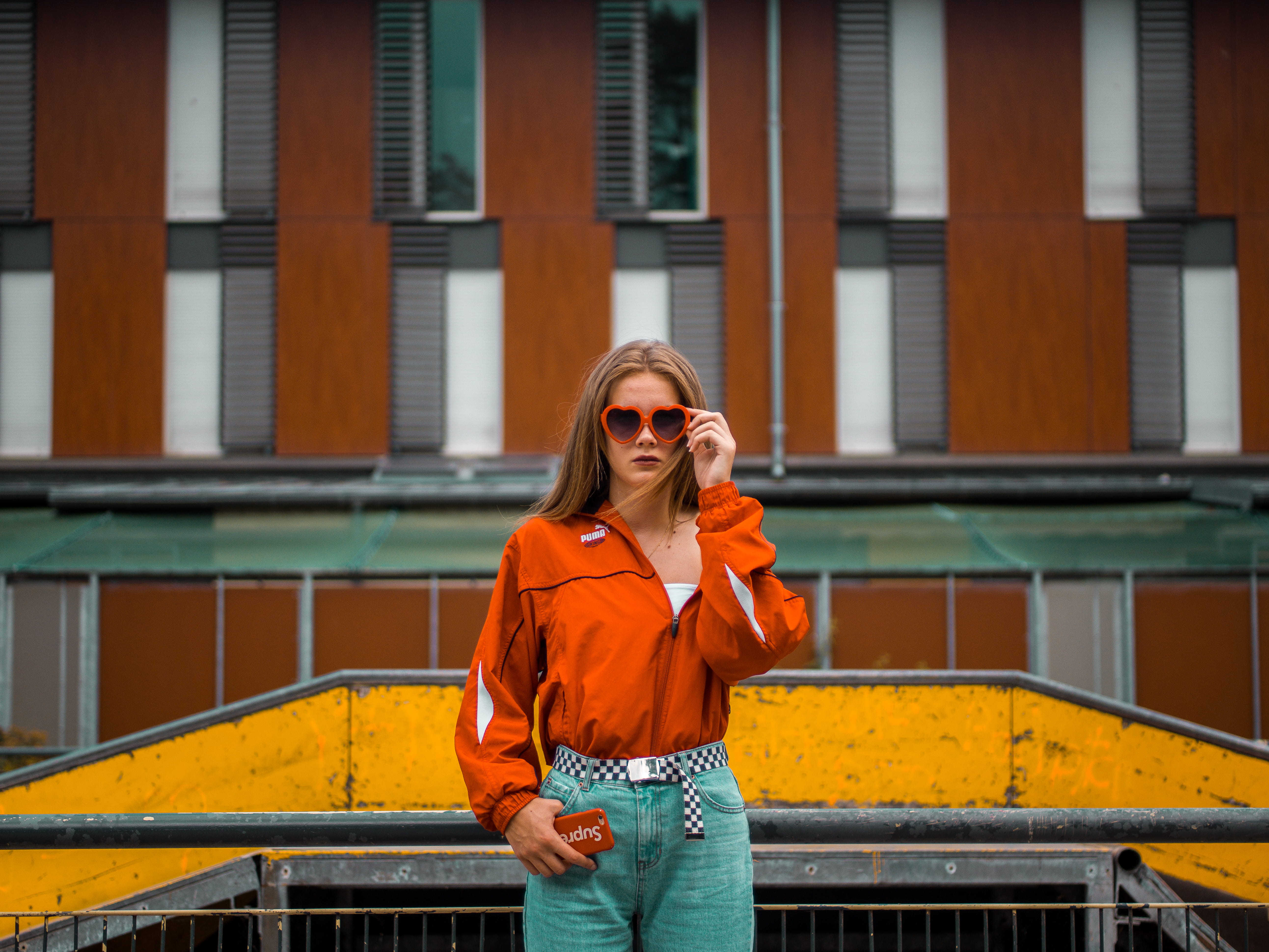 phone, young adult, beautiful woman, looking, sunglasses, hairstyle, fashion, woman, street, person, skatepark, casual clothing, heart, day, beside, built structure, HD Wallpaper