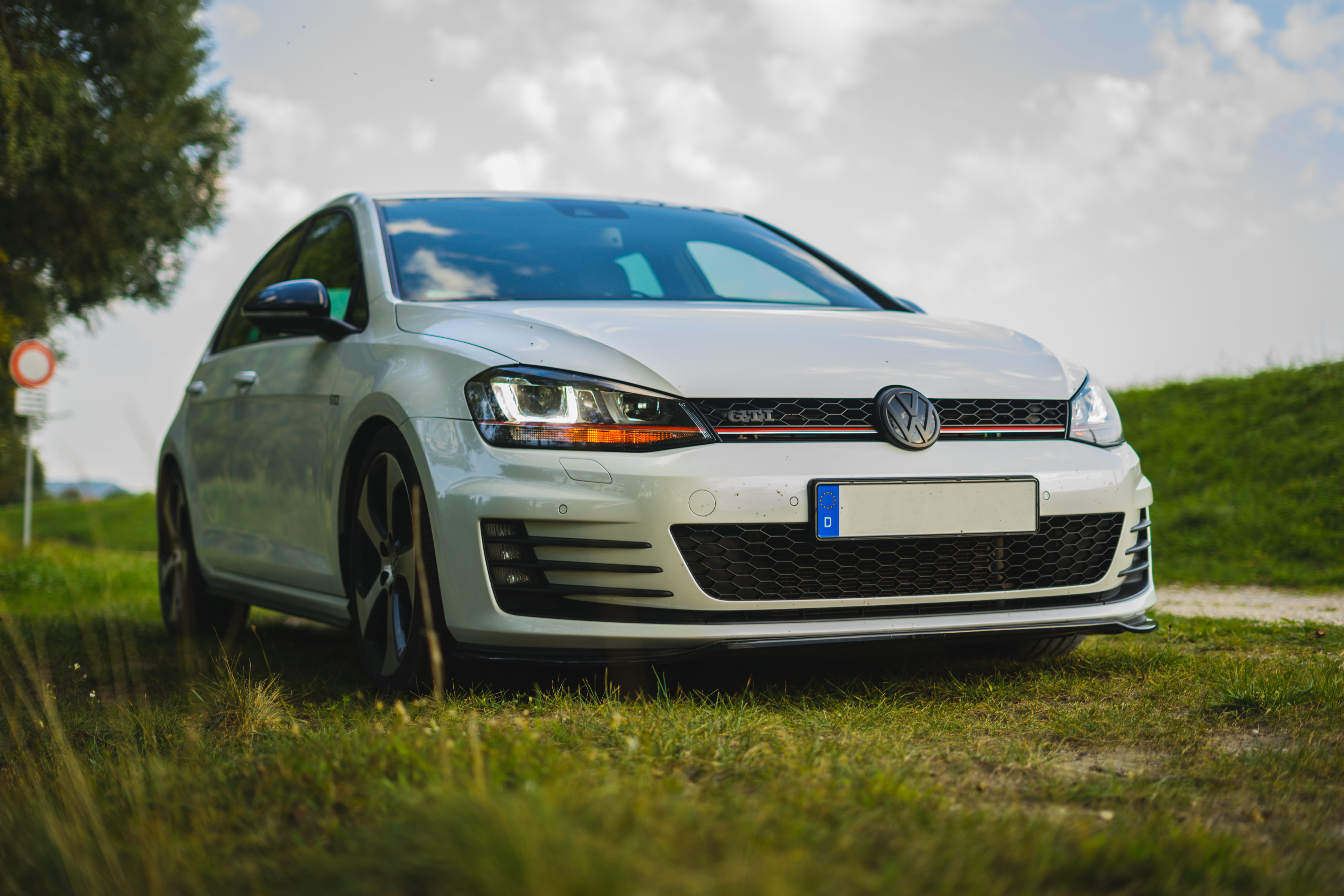 motor vehicle, bokeh, day, grass, green color, car on side of road, white, land vehicle, countryside, volkswagen, motion, gti, turquoise colored, no people, HD Wallpaper