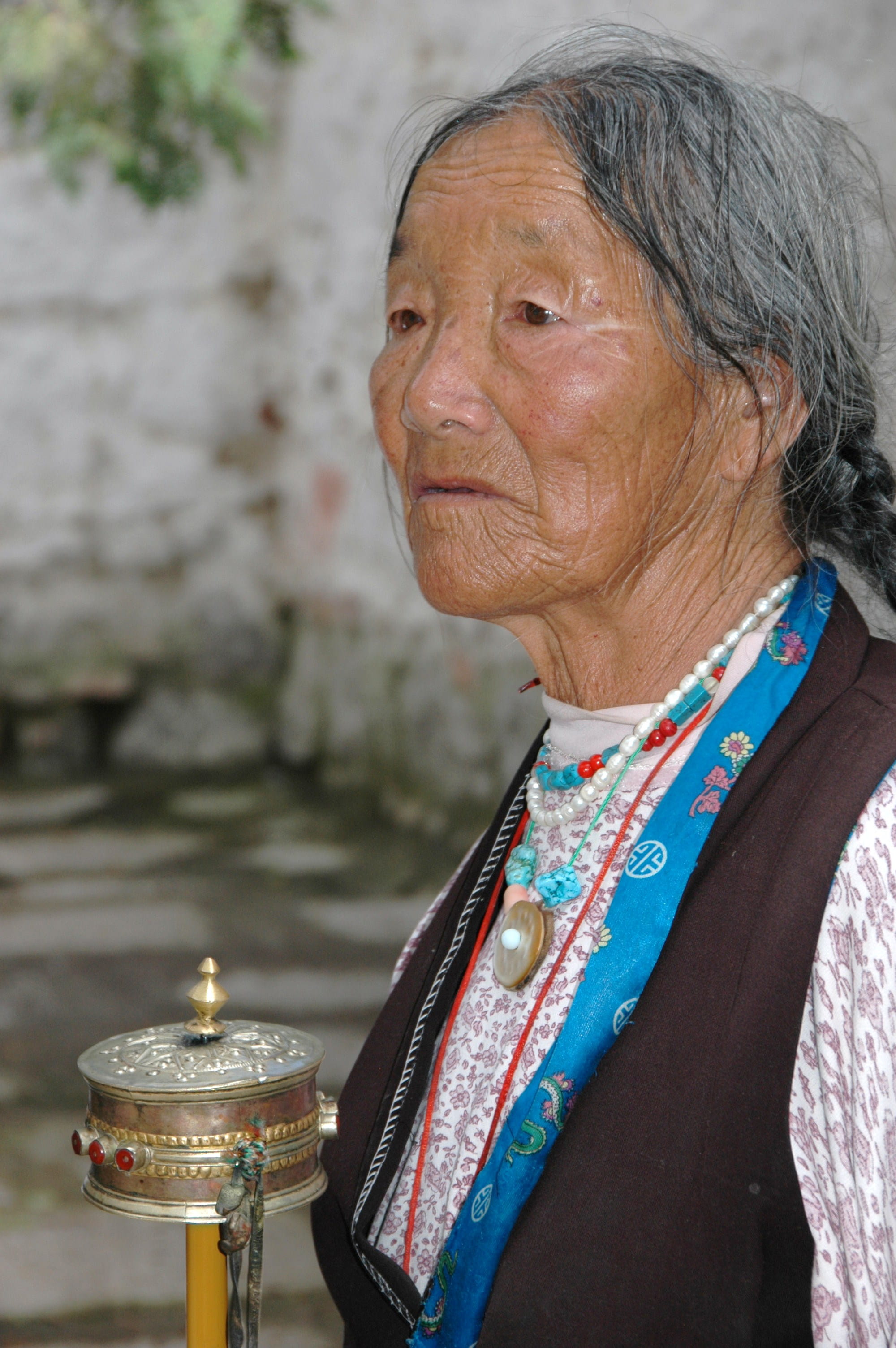 ornament, worship, 2K, day, lifestyles, senior women, looking, person, shrine, focus on foreground, adult, tibet, bead necklace, finger, real people, temple, Phone HD Wallpaper