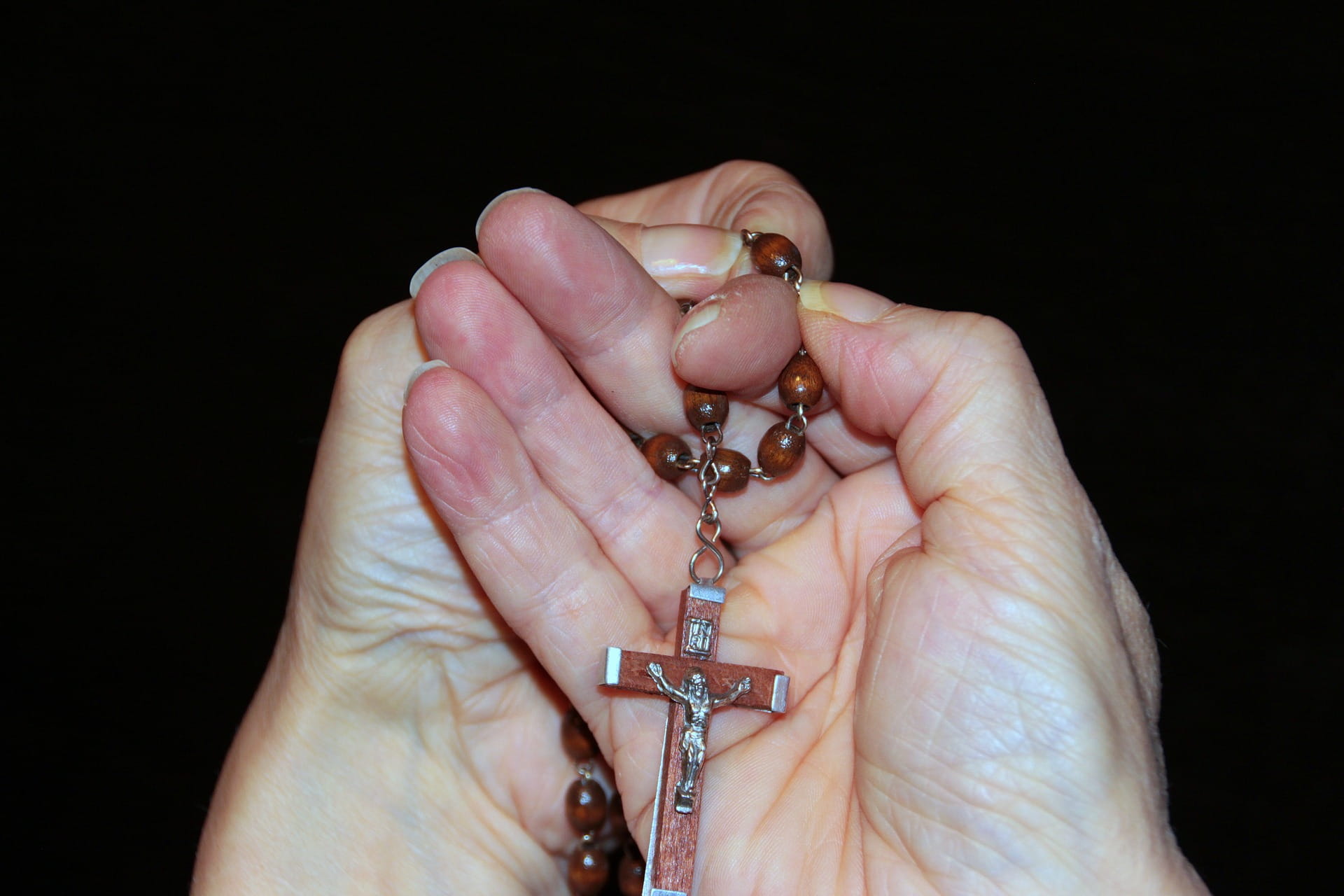 string, religious, human, emotion, jewelry, human body part, ring, praying, pray, black background, activity, body part, one person, hand, human hand, cross, HD Wallpaper