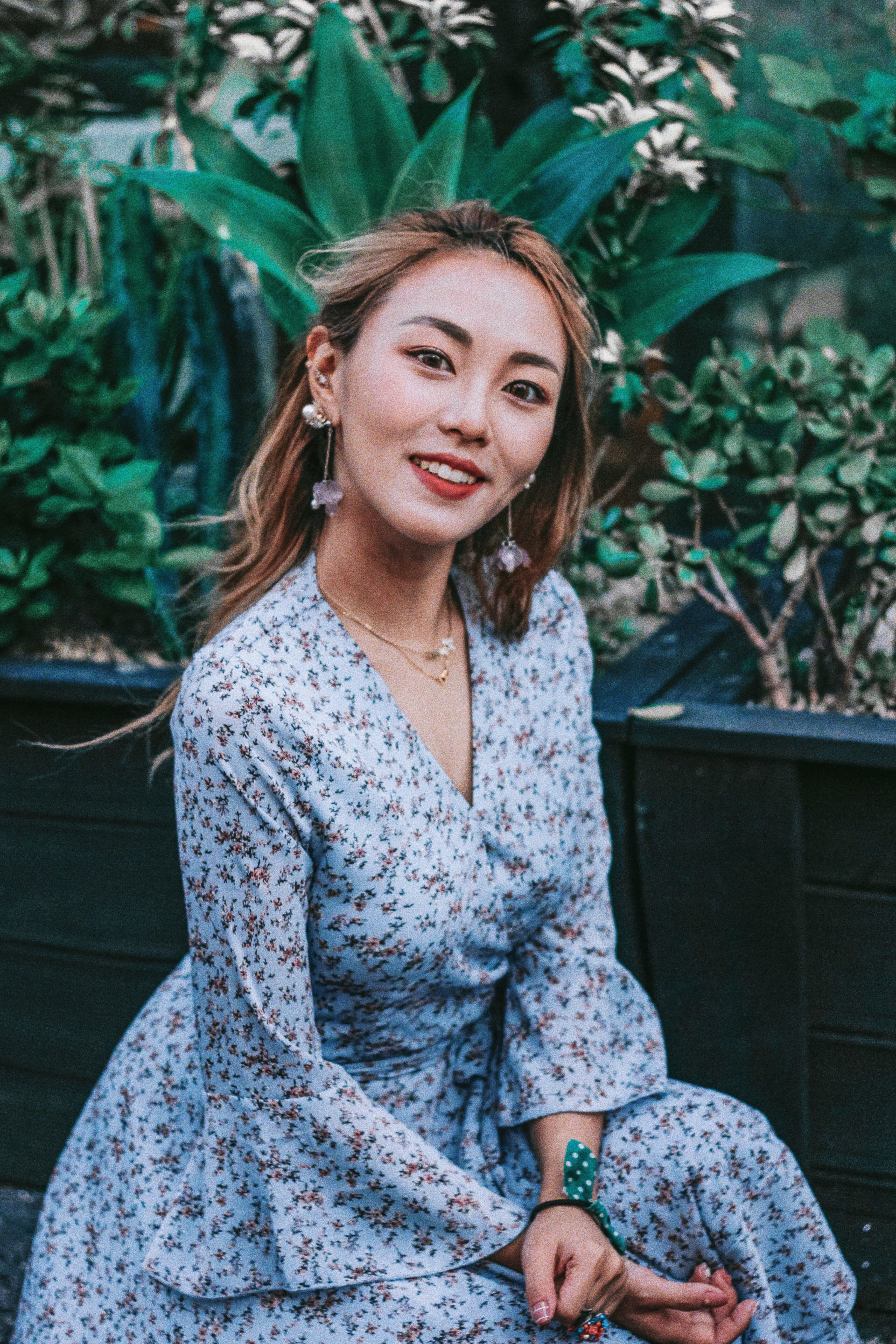 smiling, one person, leisure activity, plant, sitting, beauty, looking at camera, day, woman, contemplation, korean, wearing, portrait, real people, outdoors, Phone HD Wallpaper