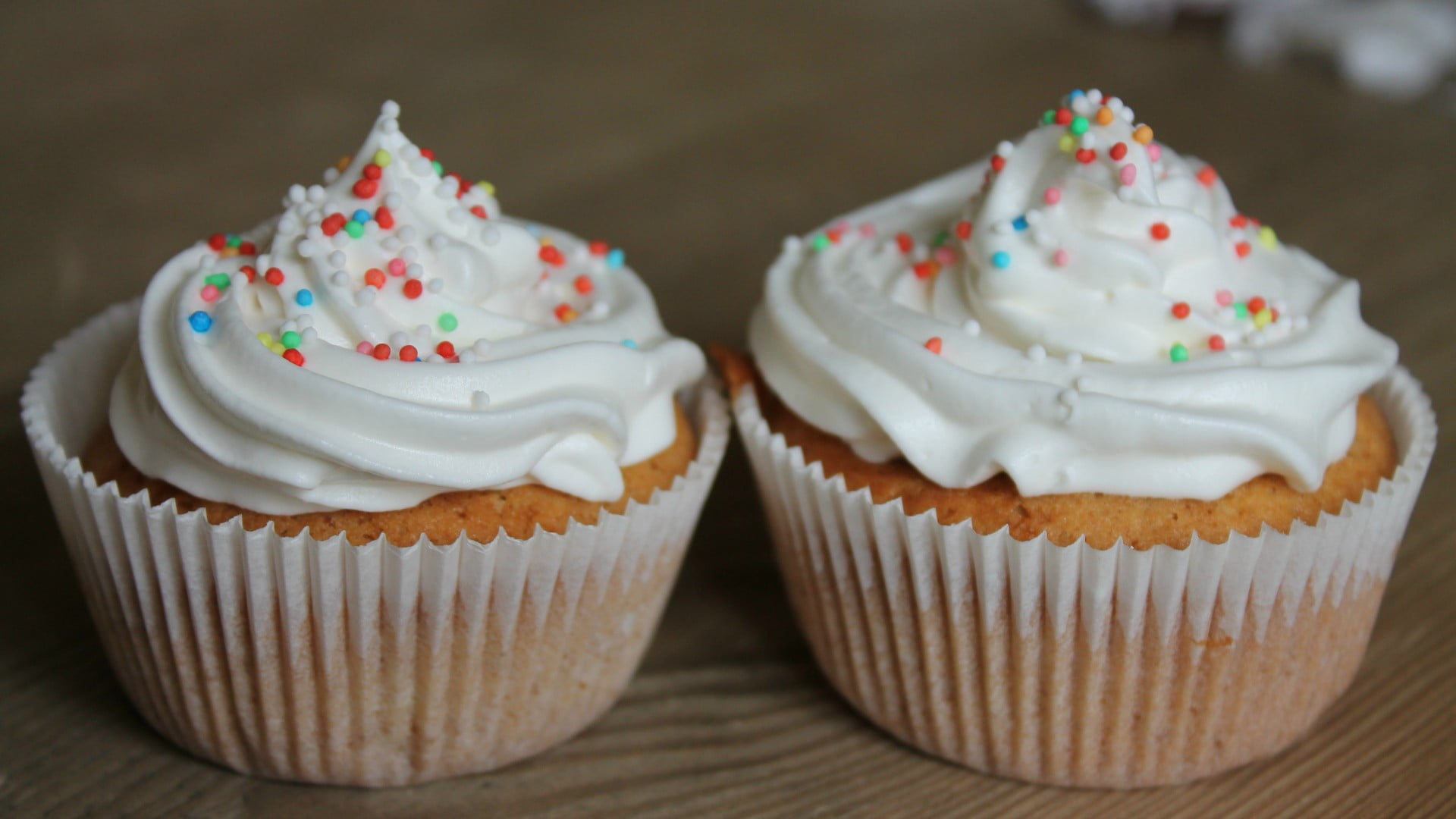 sprinkles, food and drink, 1080P, cake, indulgence, focus on foreground, dessert, cupcake holder, food, temptation, icings, table, unhealthy eating, close-up, HD Wallpaper
