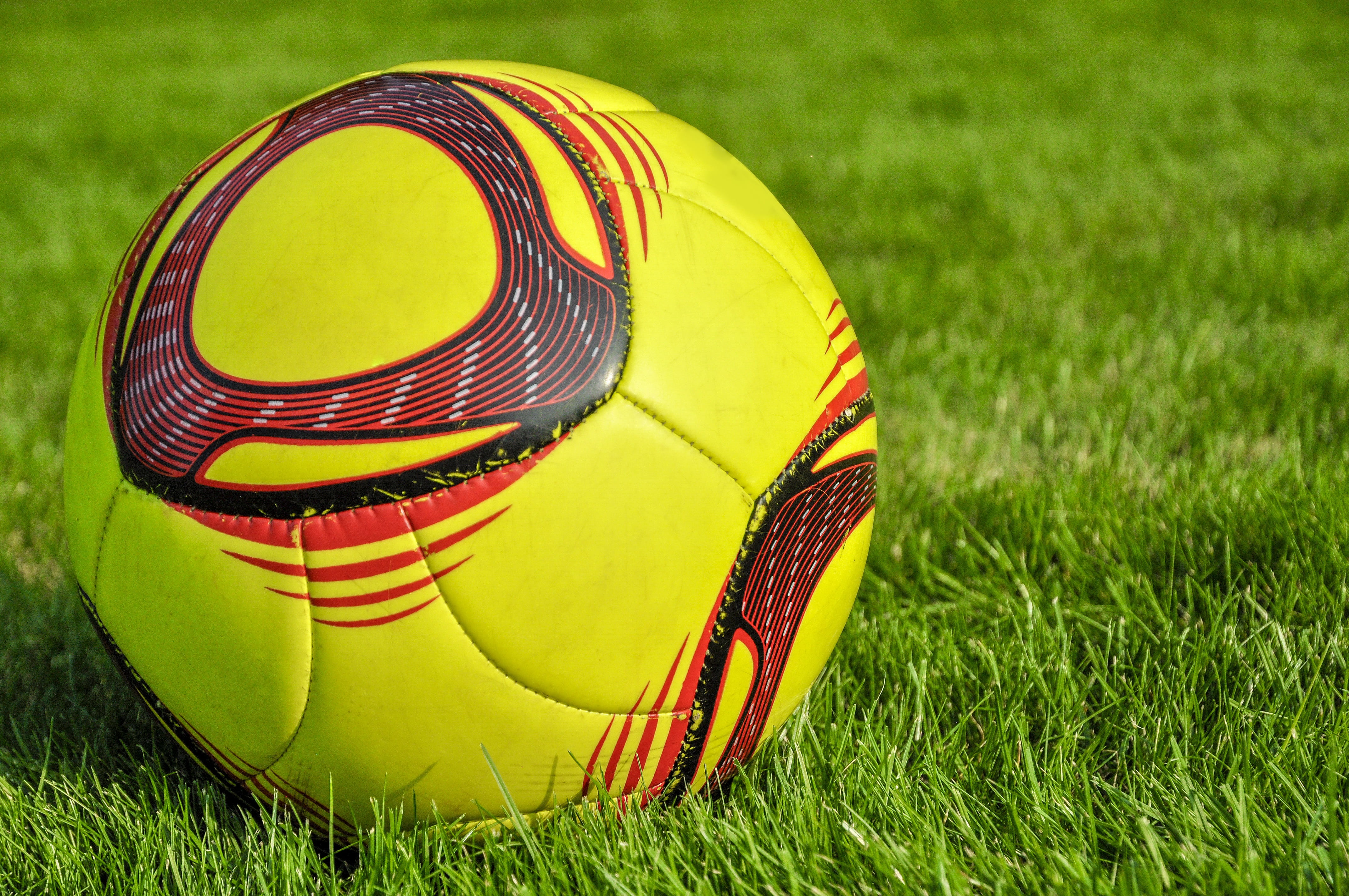 stadion, player, soccer, soccer ball, land, the ball, yellow, field, sports equipment, green color, soccer ball on the grass, focus on foreground, ball, HD Wallpaper