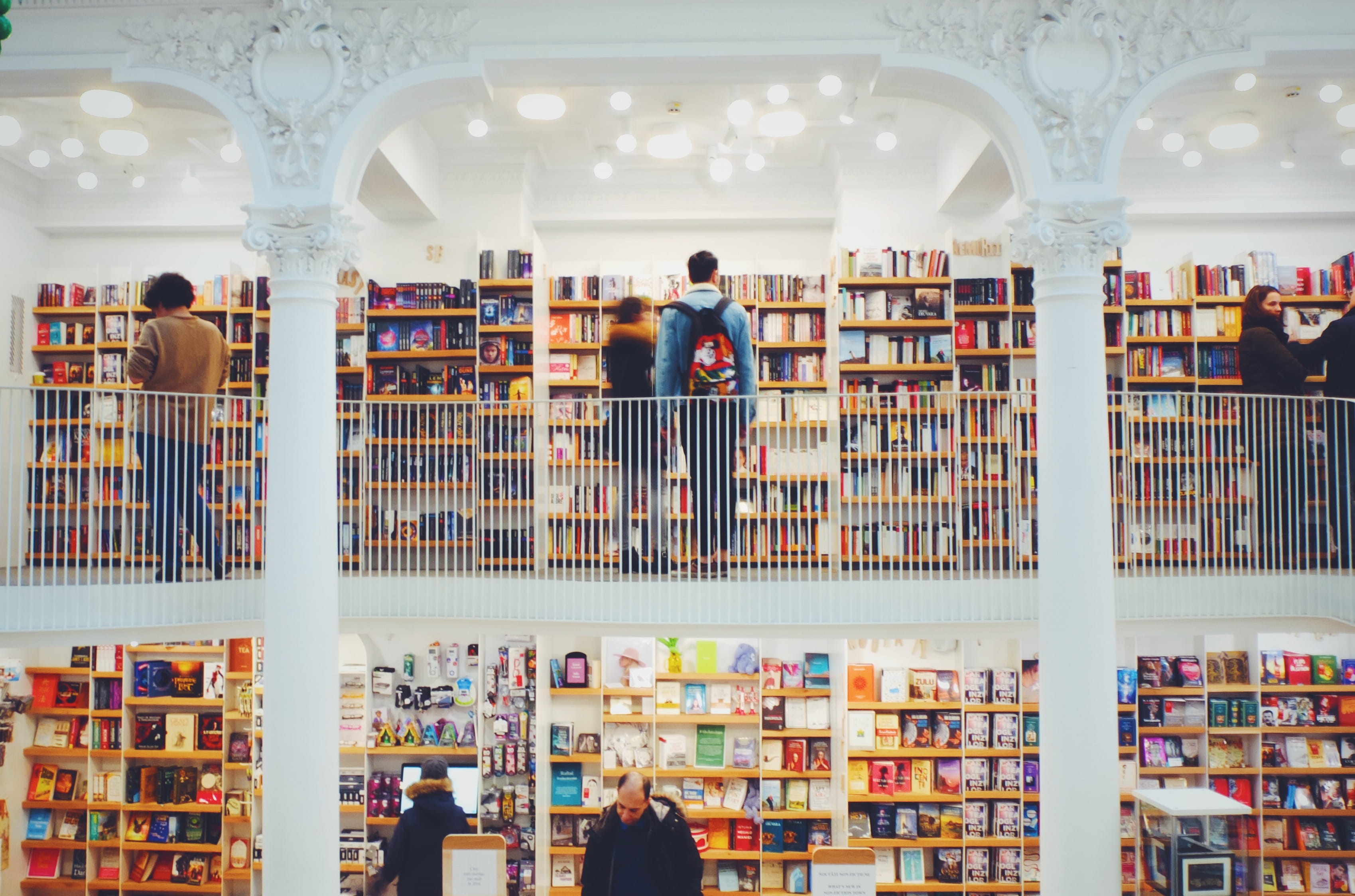 people, education, books, retail, publication, book, book store, architecture, buying, standing, 2K, adult, bucharest, indoors, shelf, library, real people, HD Wallpaper