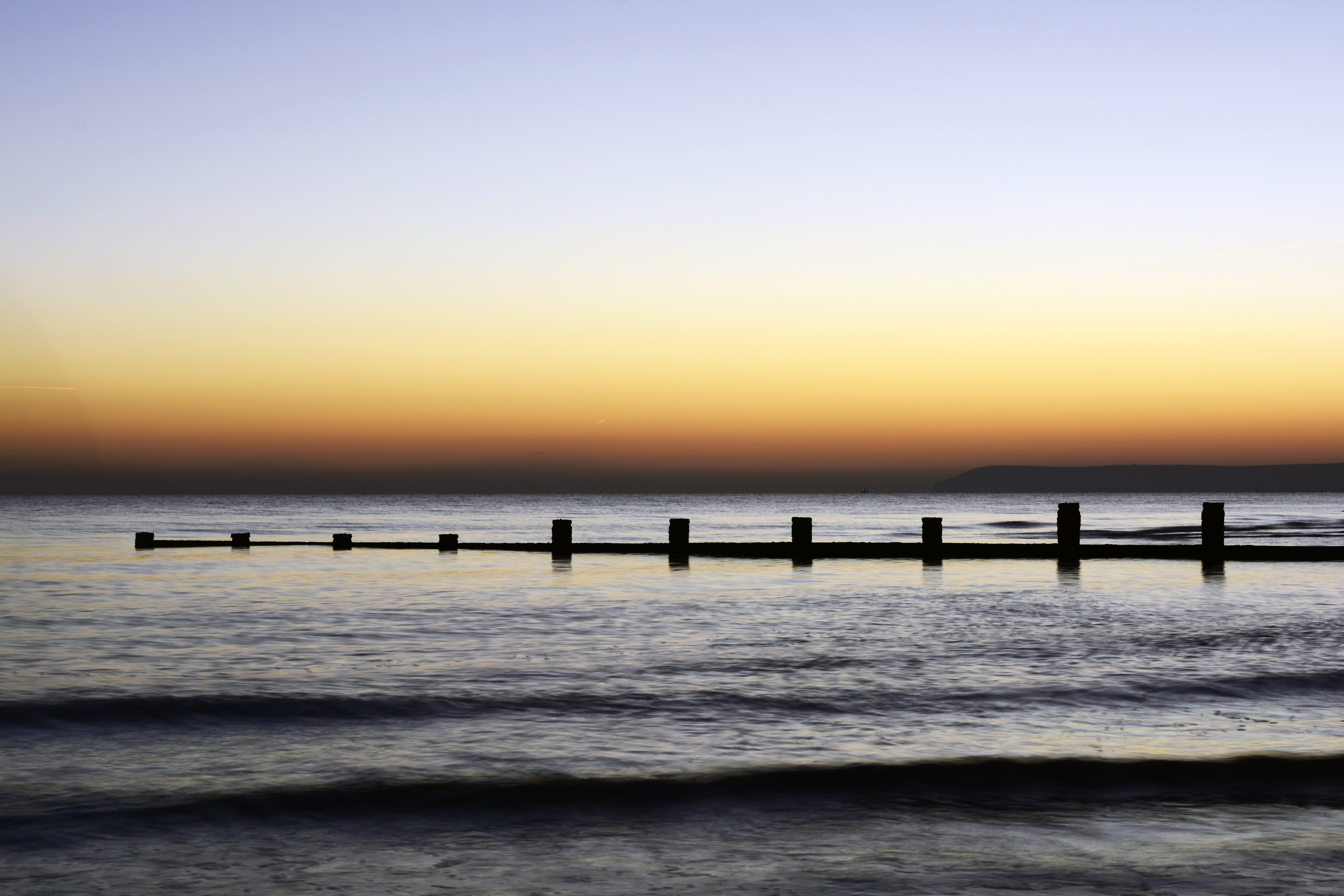 stone, wooden post, home, woman, tranquil scene, dock, horizon over water, sea, idyllic, outdoors, meditation, rest, female, calm, sky, wellness, horizon, HD Wallpaper