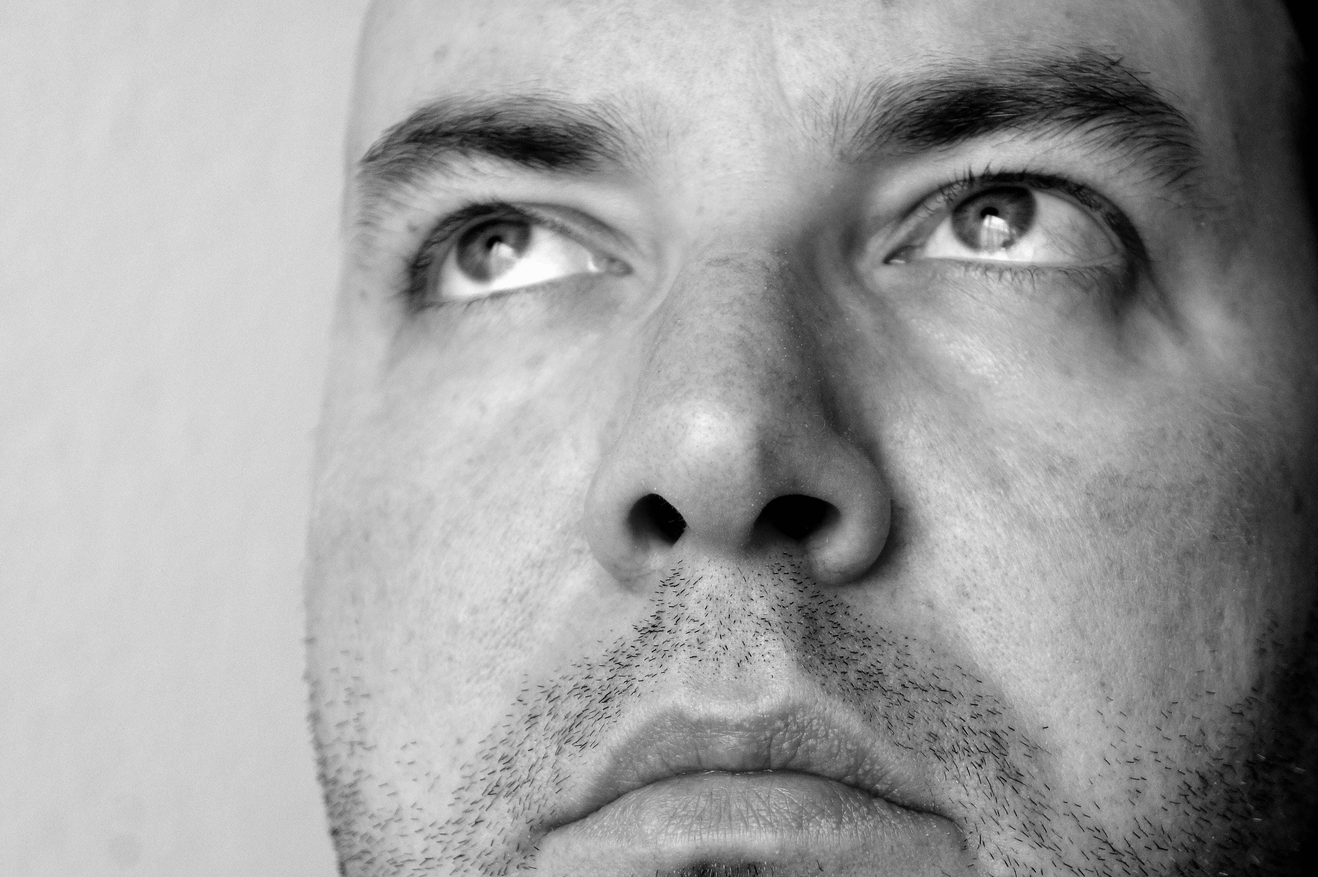 black And White, young adult, human eye, 4K, males, people, eye, emotion, grayscale, indoors, eyebrow, portrait, one Person, nose, adult, looking at camera, HD Wallpaper
