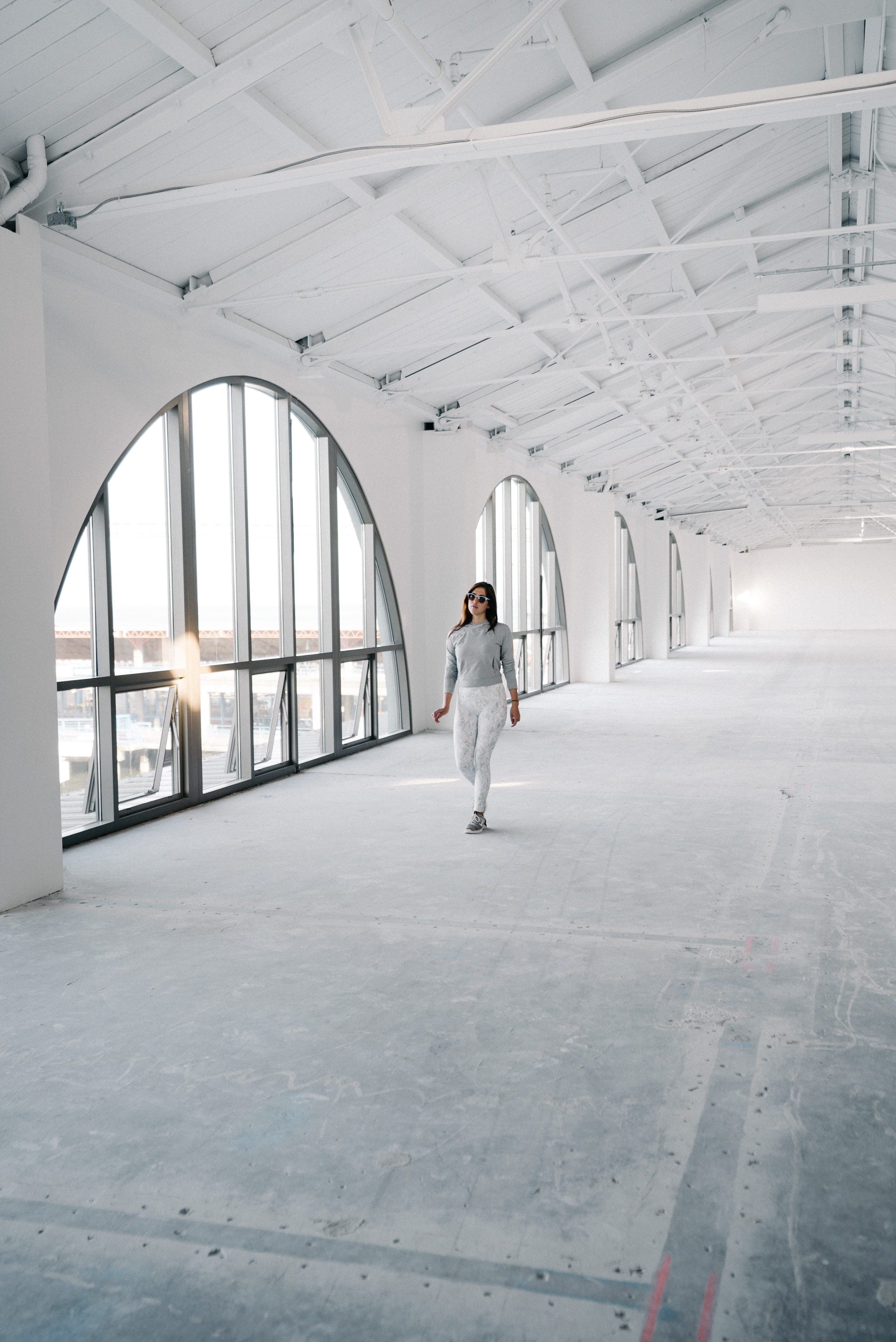 white color, woman, empty, young adult, corridor, full length, casual clothing, real people, lobby, day, the way forward, building, furniture, room, glass, Phone HD Wallpaper