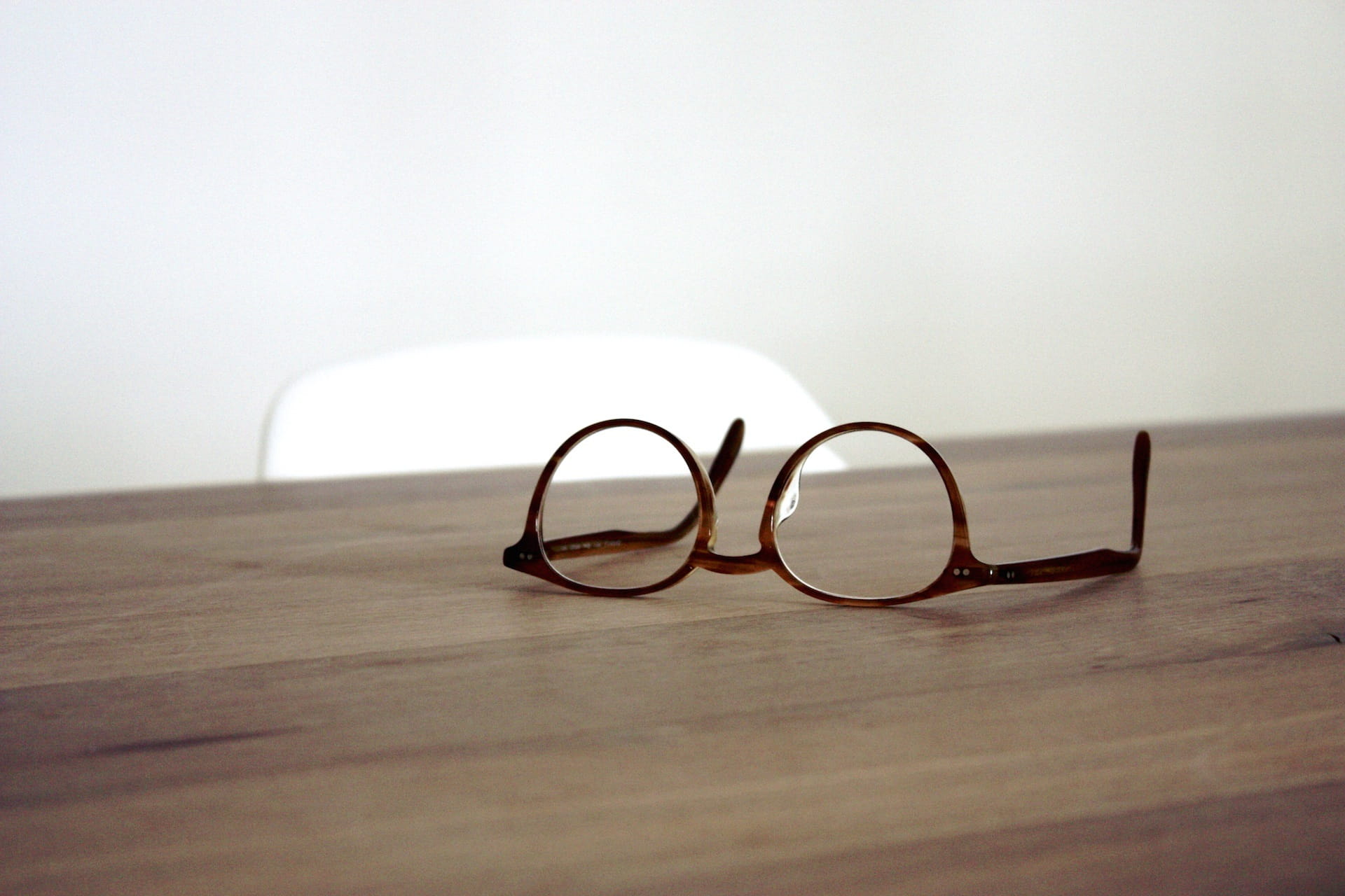eyewear, glass - material, personal accessory, sight, eyes, indoors, close-up, single object, 1080P, dspecs, optical, absence, wooden table, positive emotion, HD Wallpaper